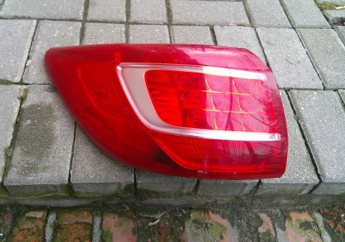 KIA SPORTAGE III 10-14 LEWA TYLNA LAMPA ORYGINAŁ
