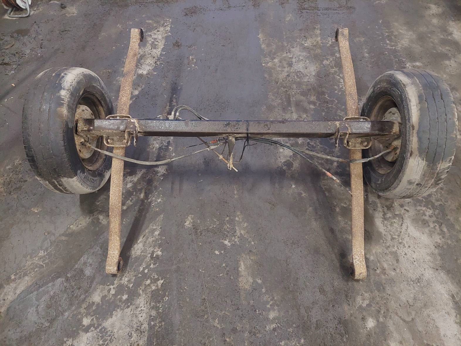 OŚ BELKA ZAWIESZENIA TYŁ + RESORY + KOŁA NA PRZYCZEPKĘ FORD TRANSIT V