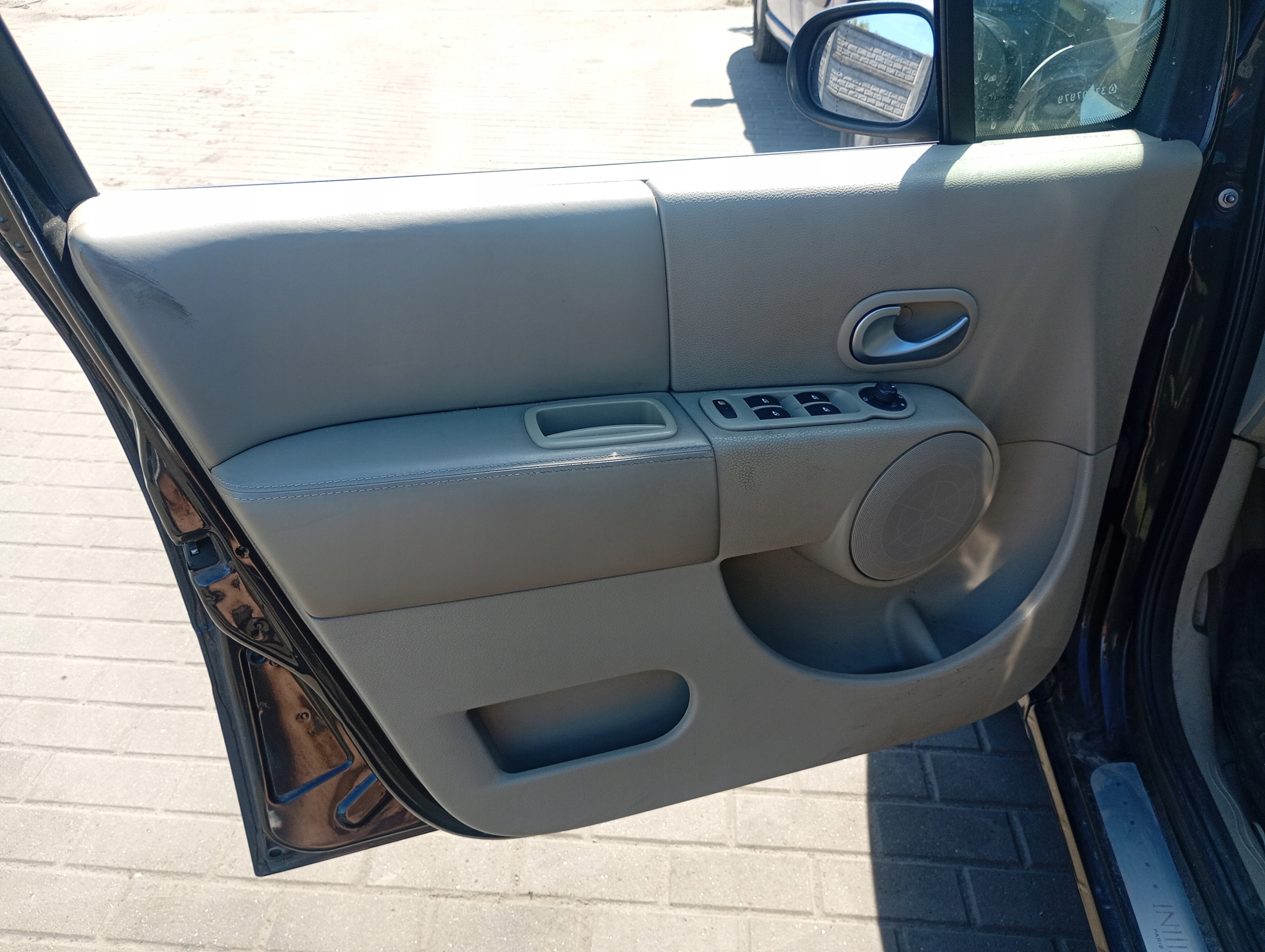 tapacír bok levá předek Renault Modus 1 a 04-13