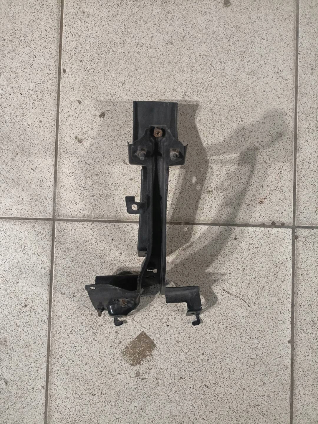 bracket of a lock bonnets Mazda CX-9 facelift 2010