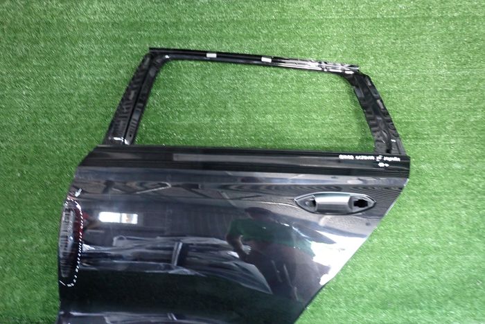 SKODA OCTAVIA IV KOMBI door left rear. rear part