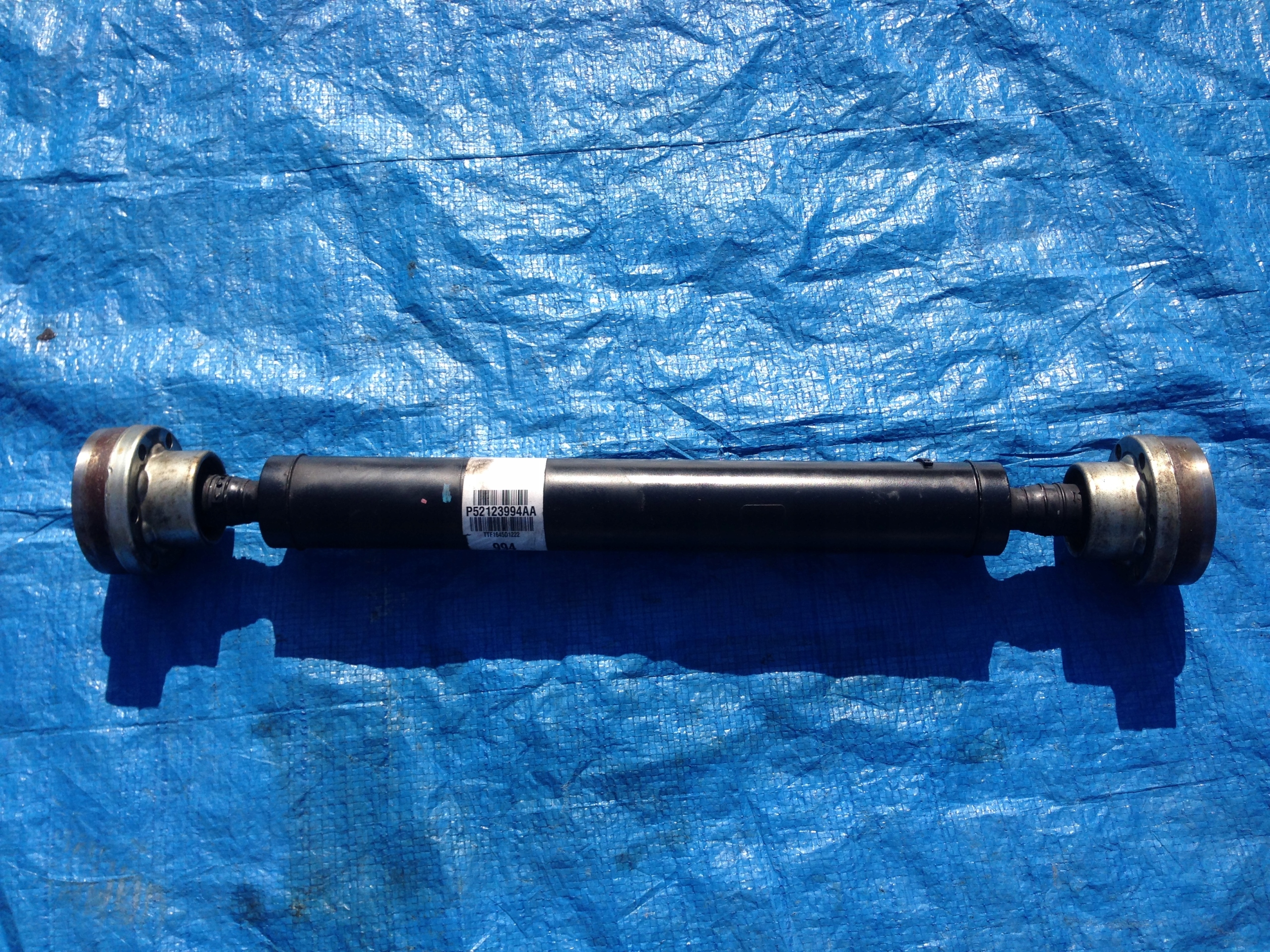 52123994AA - JEEP GRAND CHEROKEE 15 LIFT 3.0 CRD WK2 ПЕРЕДНИЙ ВАЛ