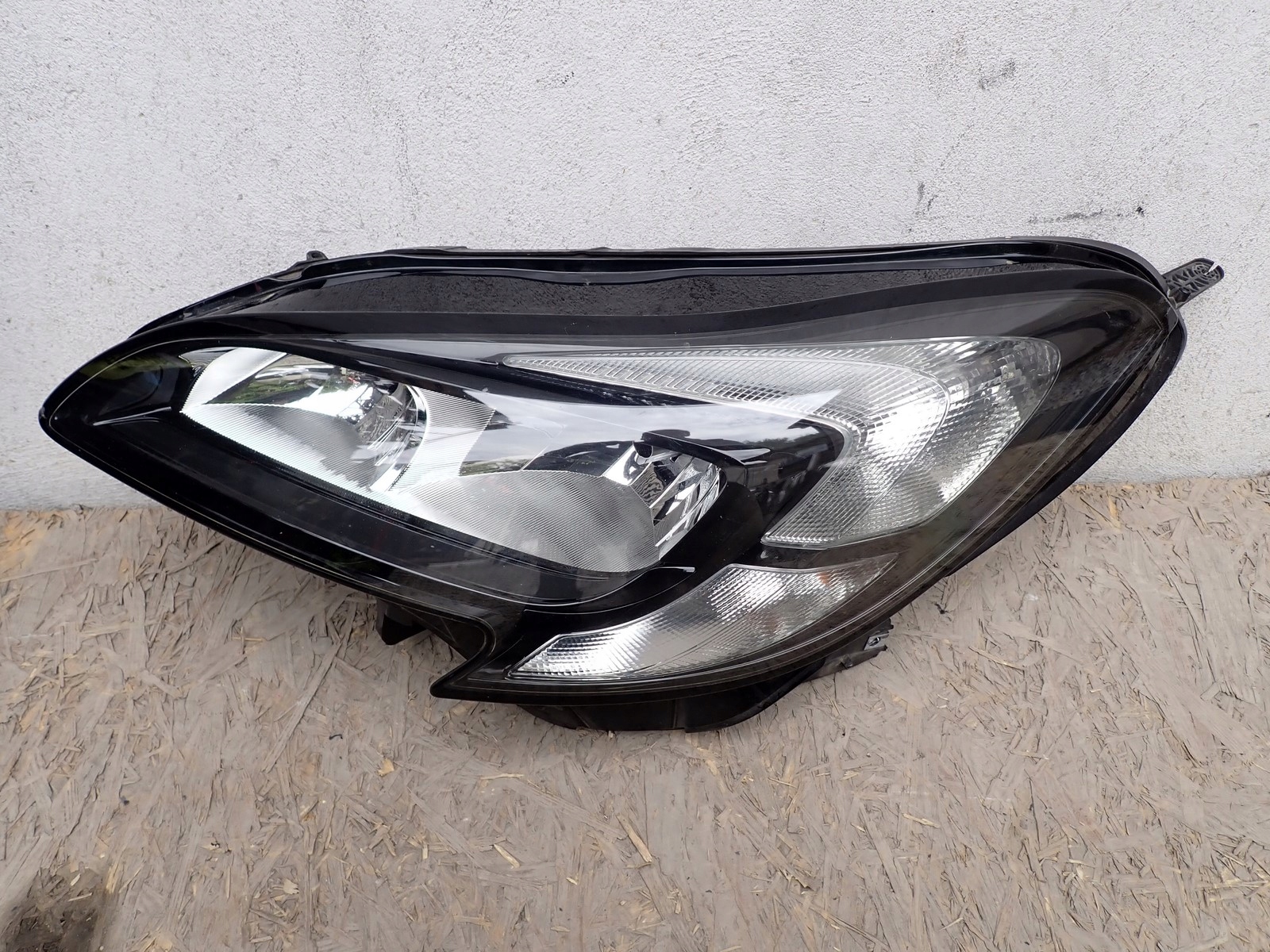 light left REFLEKTOR left OPEL CORSA E X15 2014-2019R 39108222