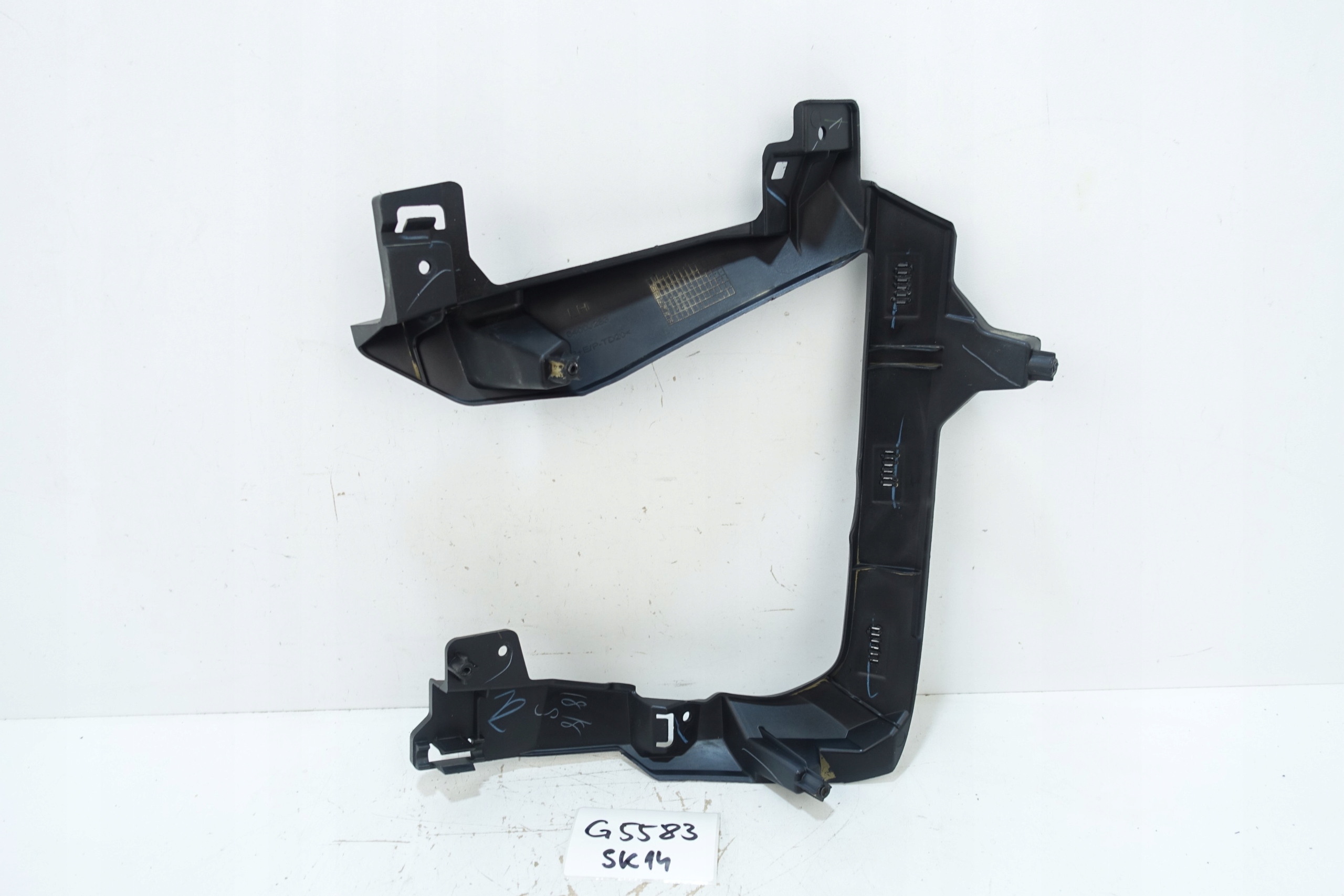 frame holder fog lights left front MITSUBISHI L200 VI 19- 6400J283