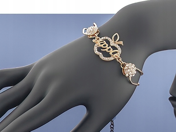 

Złota bransoletka Charms