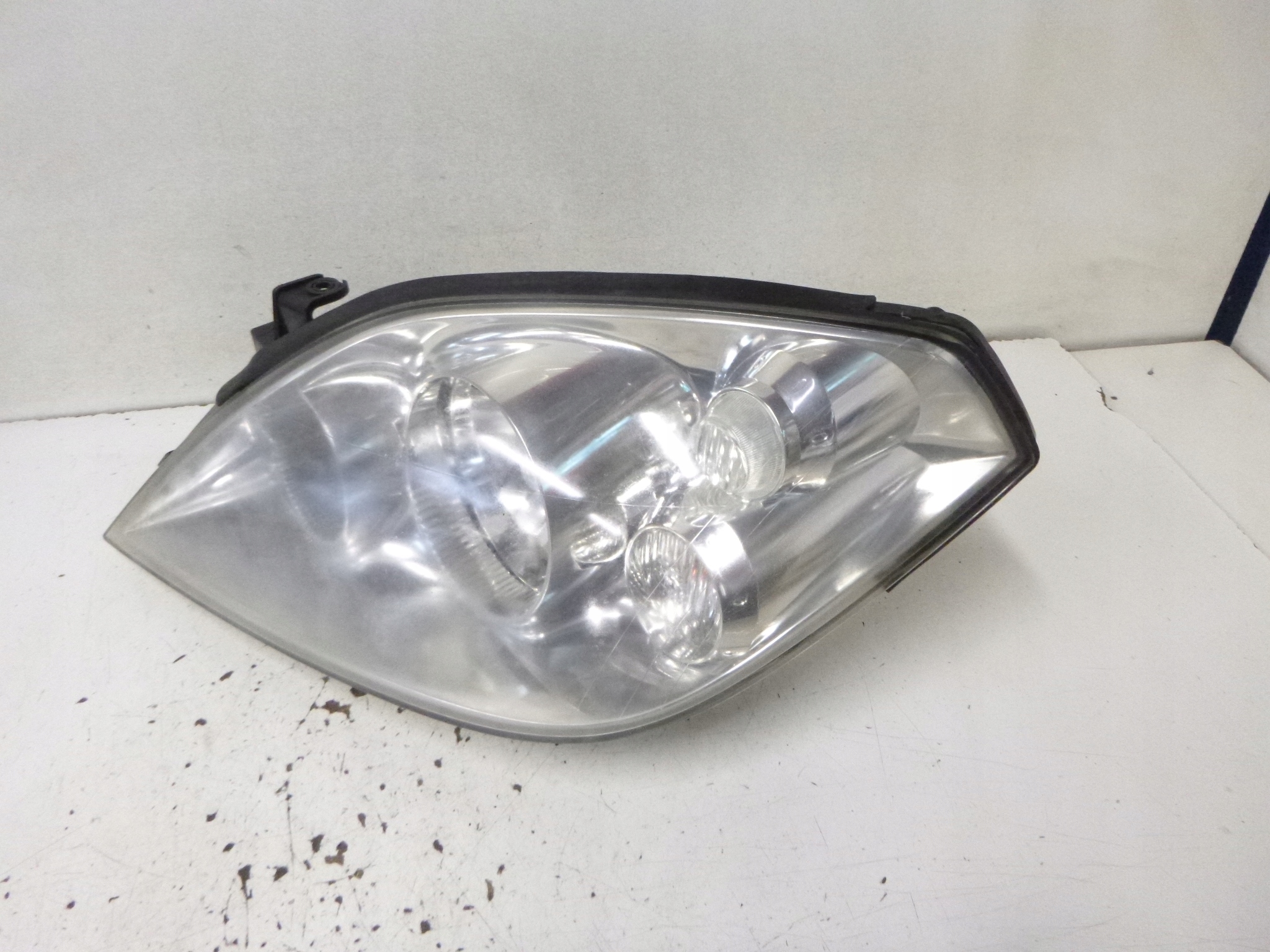 light front Nissan Primera P12 2002r. HELLA 1EJ 238 010-01