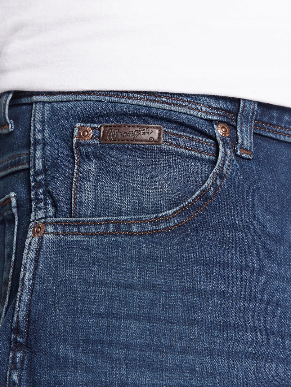 Wrangler TEXAS SLIM Silkyway EPIC SOFT ELASTYCZNE SPODNIE JEANSOWE W46 L30 Kolor niebieski