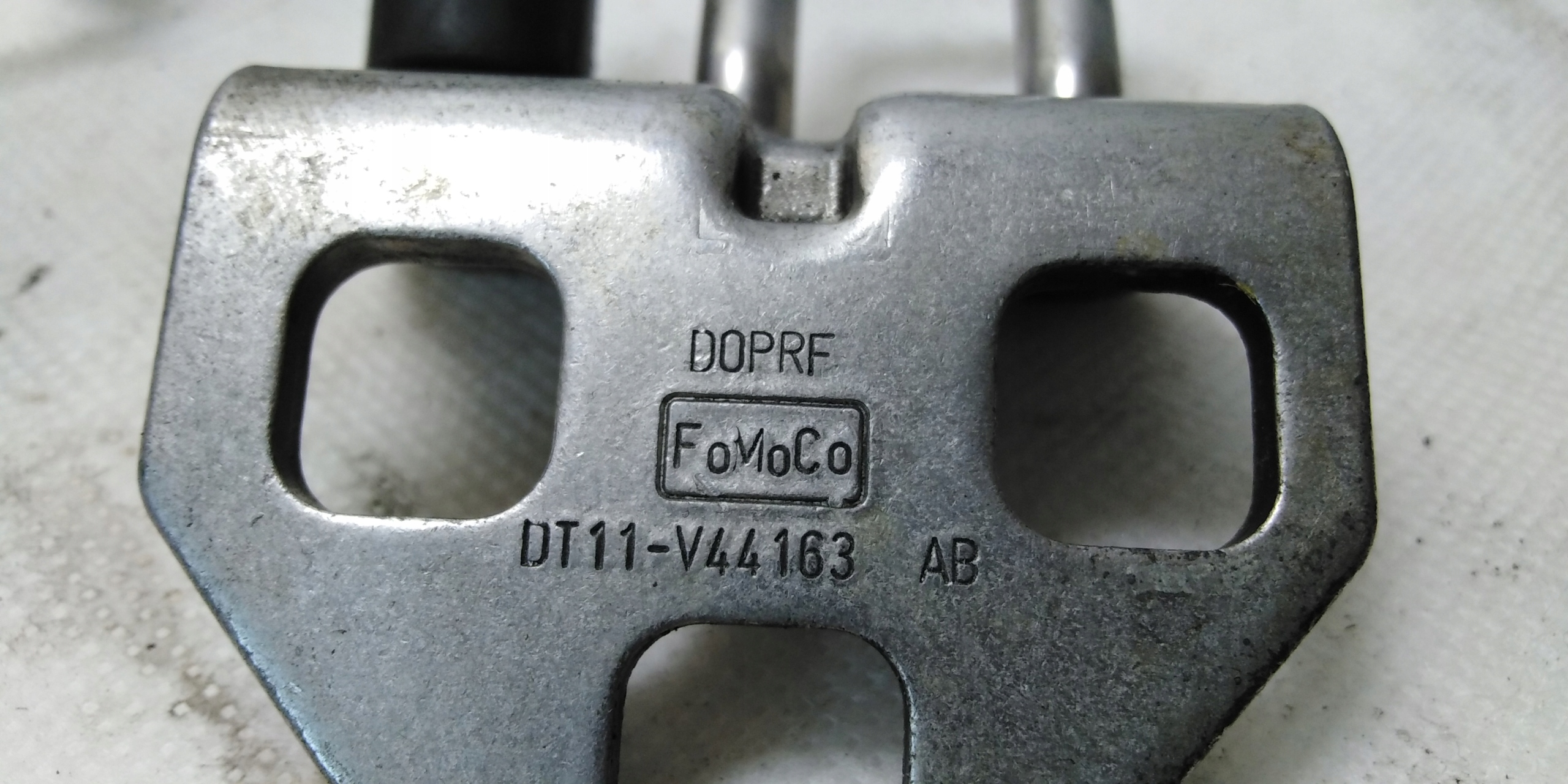 TRANSIT CONNECT MK2 RYGIEL DRZWI TYŁ SKRZYDEŁKA Producent części Ford OE