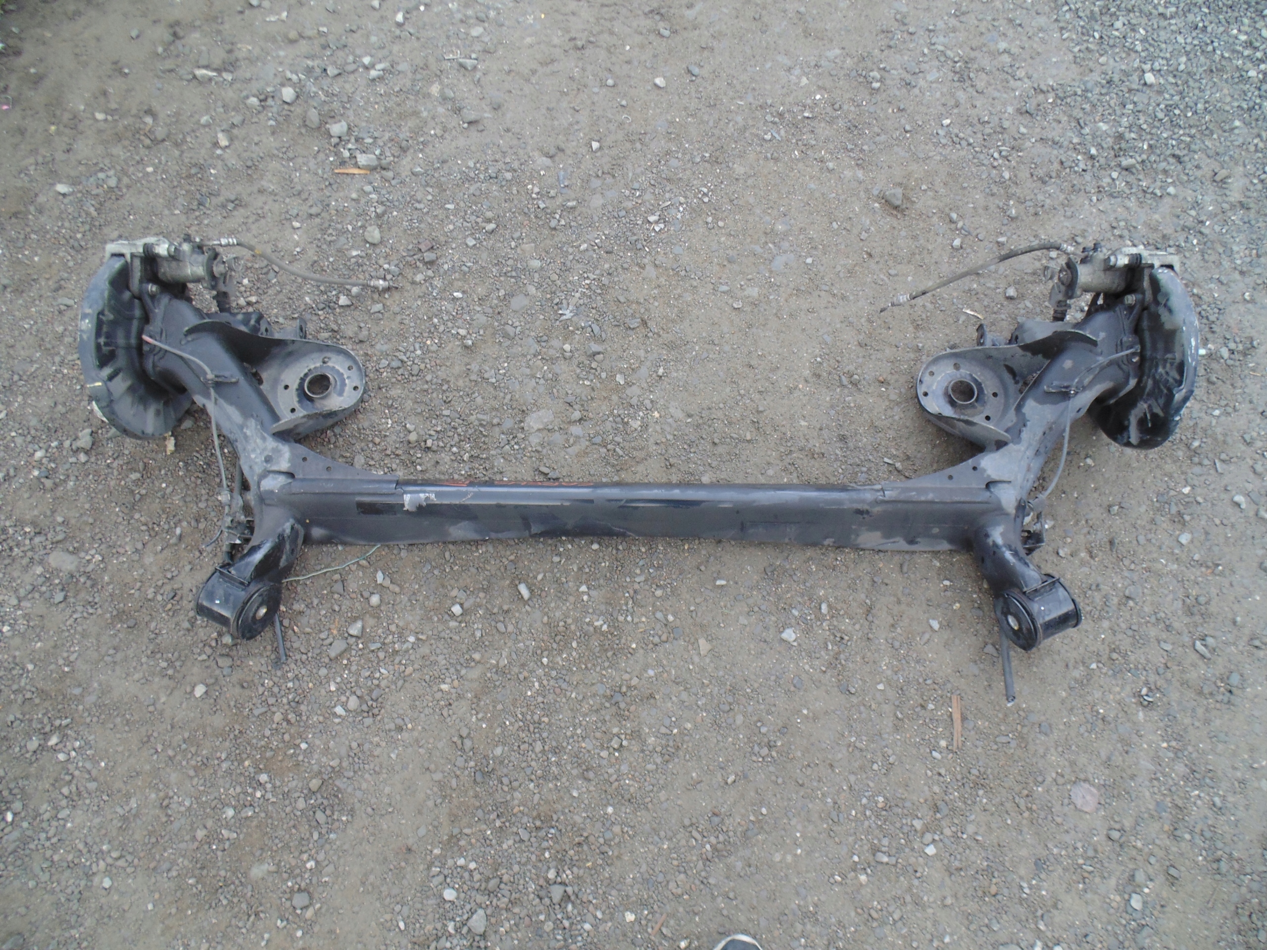 ZAWIESZENIE BELKA TYLNA OŚ KIA CARENS IV 2016 ROK.