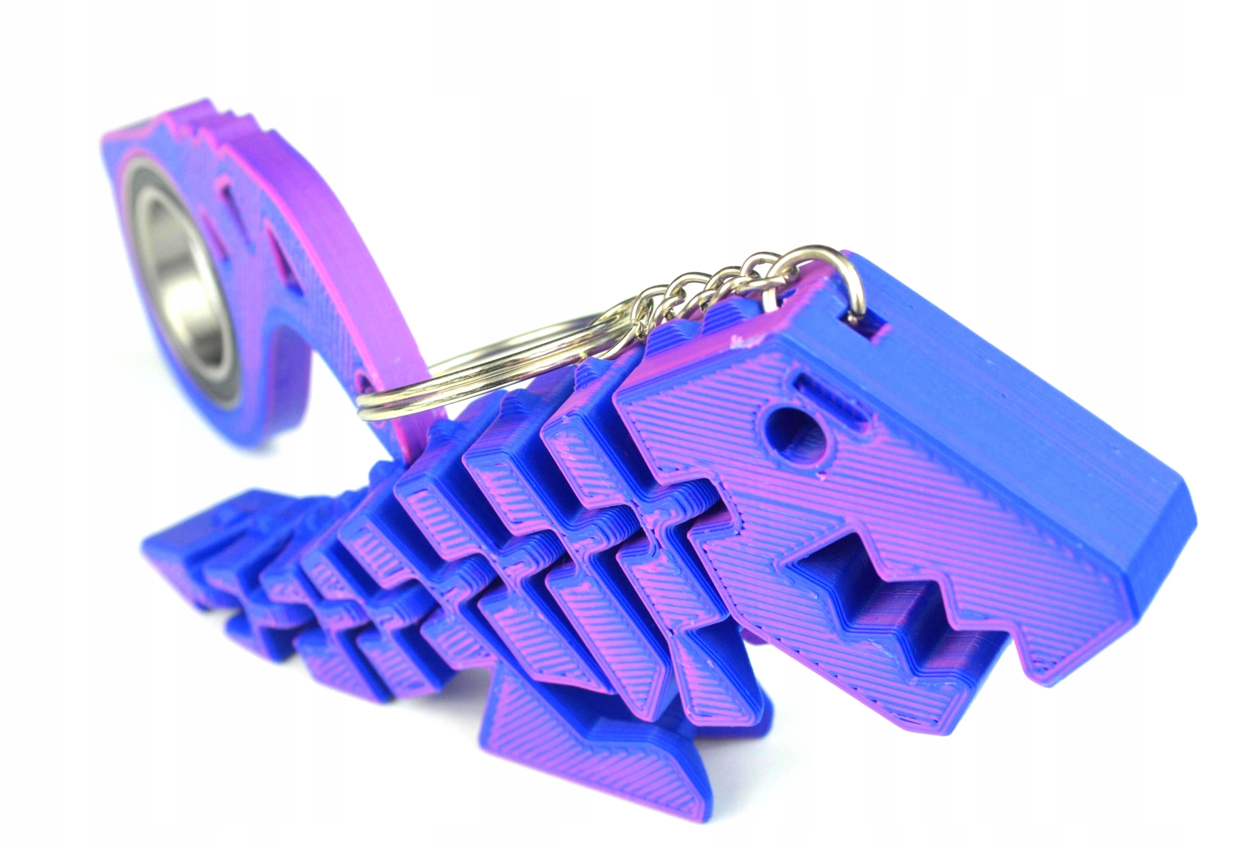 Keyrambit Zestaw KEYSPINNER Brelok + Flexi Rex Dino TikTok Kolor PINK FLUO