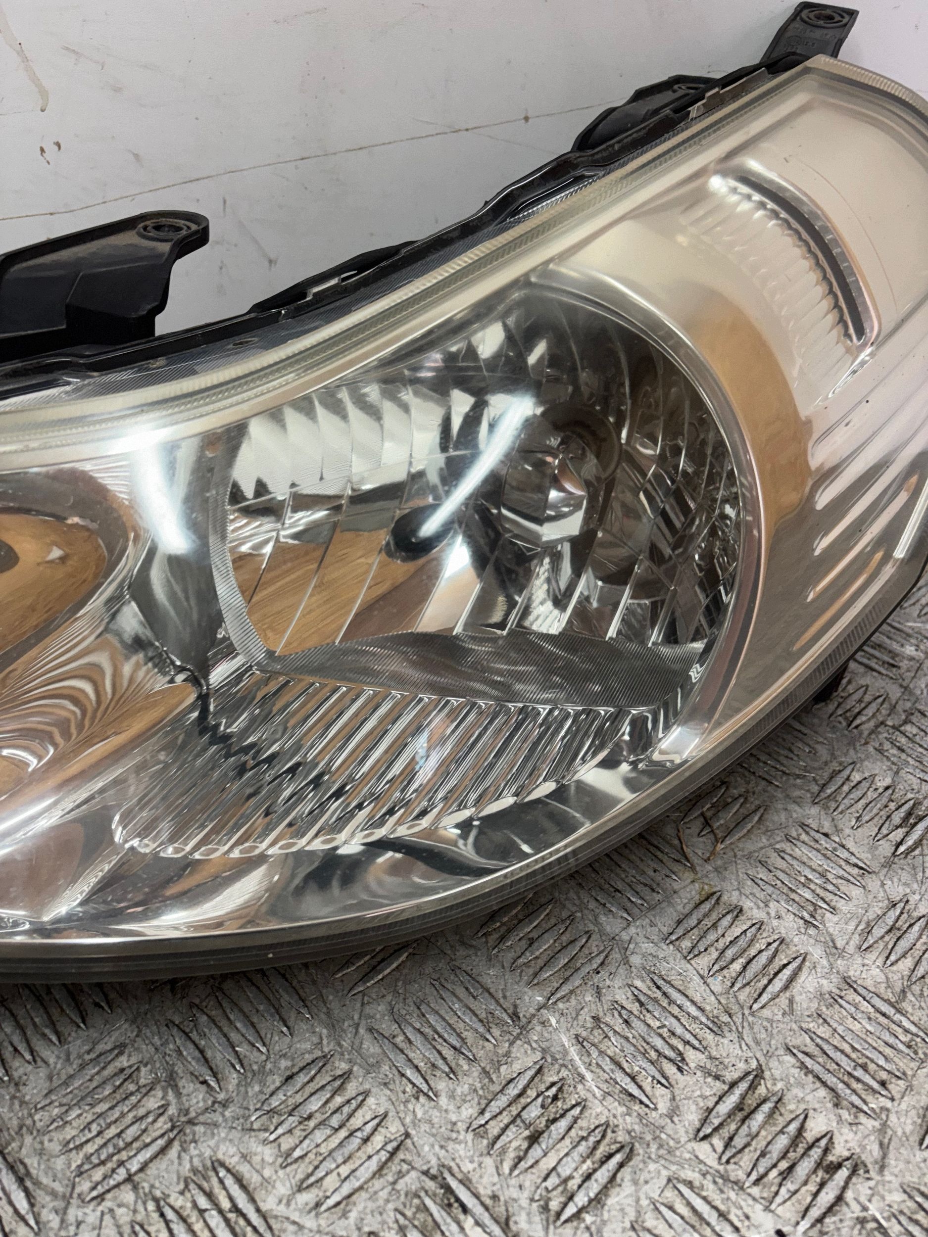 REFLEKTOR light left FIAT SEDICI SUZUKI SX4