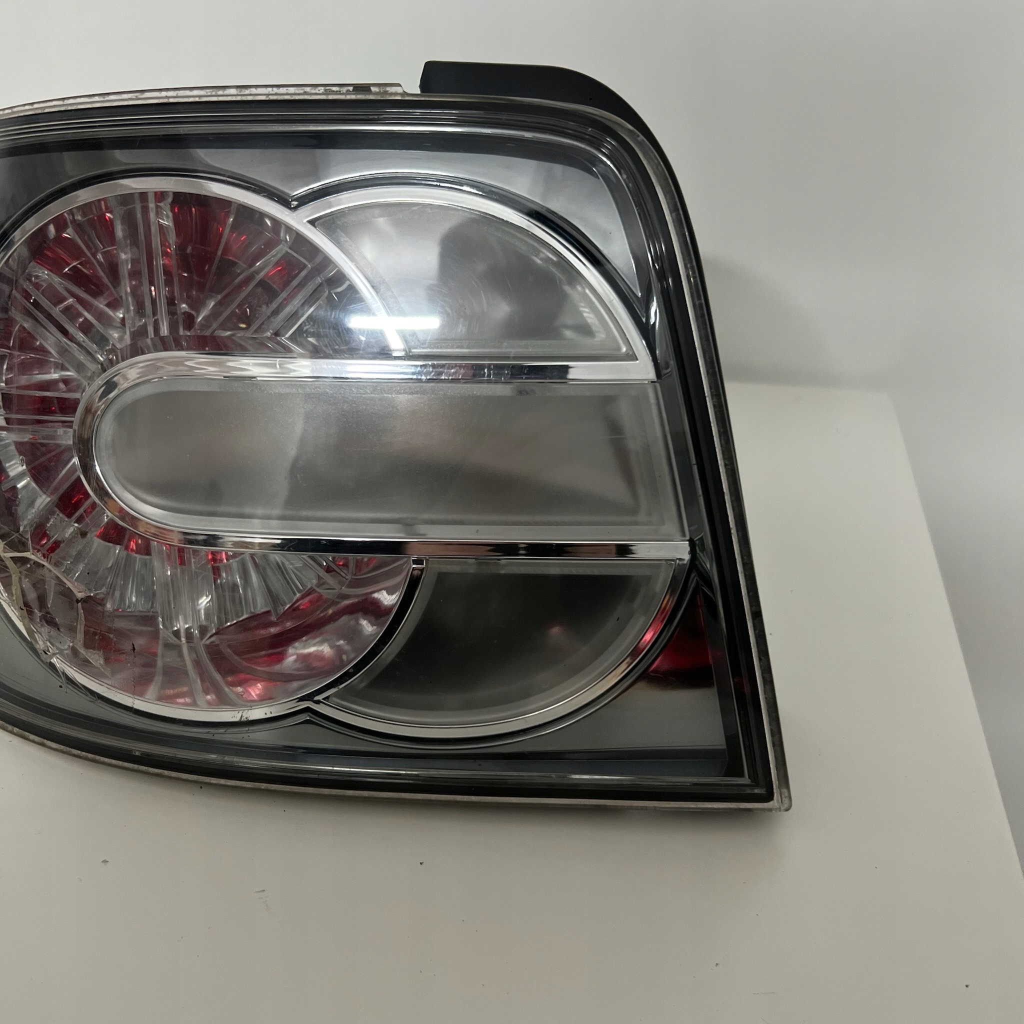 LAMPA LEWY TYŁ LEWA TYLNIA MAZDA CX-7 EG21-51150 Numer katalogowy części EG21-51150--