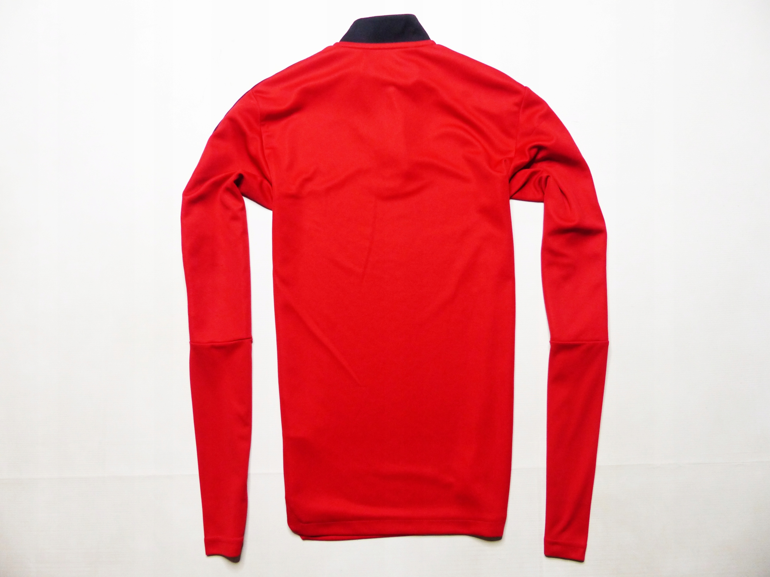 ADIDAS MANCHESTER UNITED TR TOP 2021/22 __ TRENINGOWA BLUZA rozm. XS/S Materiał dominujący poliester