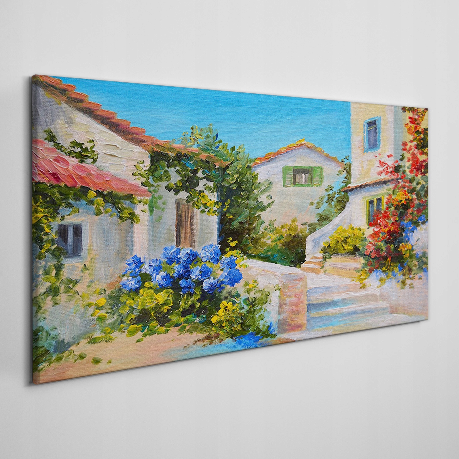 

Obraz ścienny na płótnie Budynki kwiaty 140x70 cm