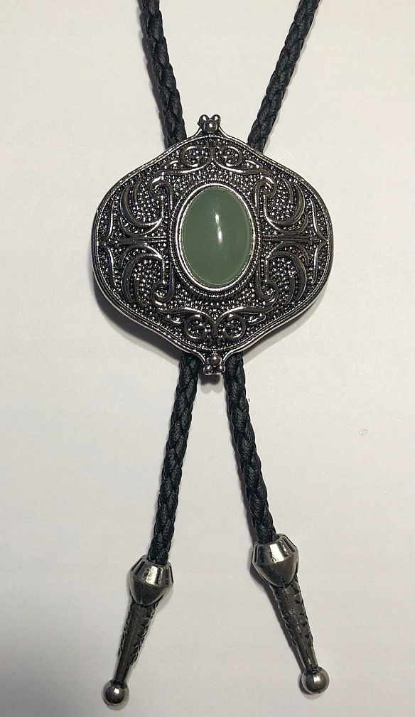 Aventuryn Zelený na štítu geometrický vzor pletenina přírodní kůže