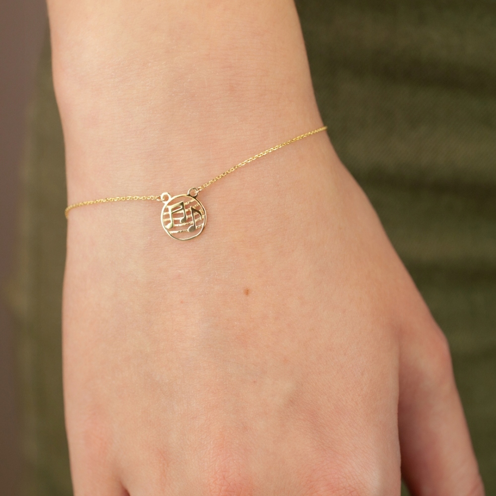 CELEBRYTKA ZŁOTA BRANSOLETKA NUTY PIĘCIOLINIA 333 Marka Deem