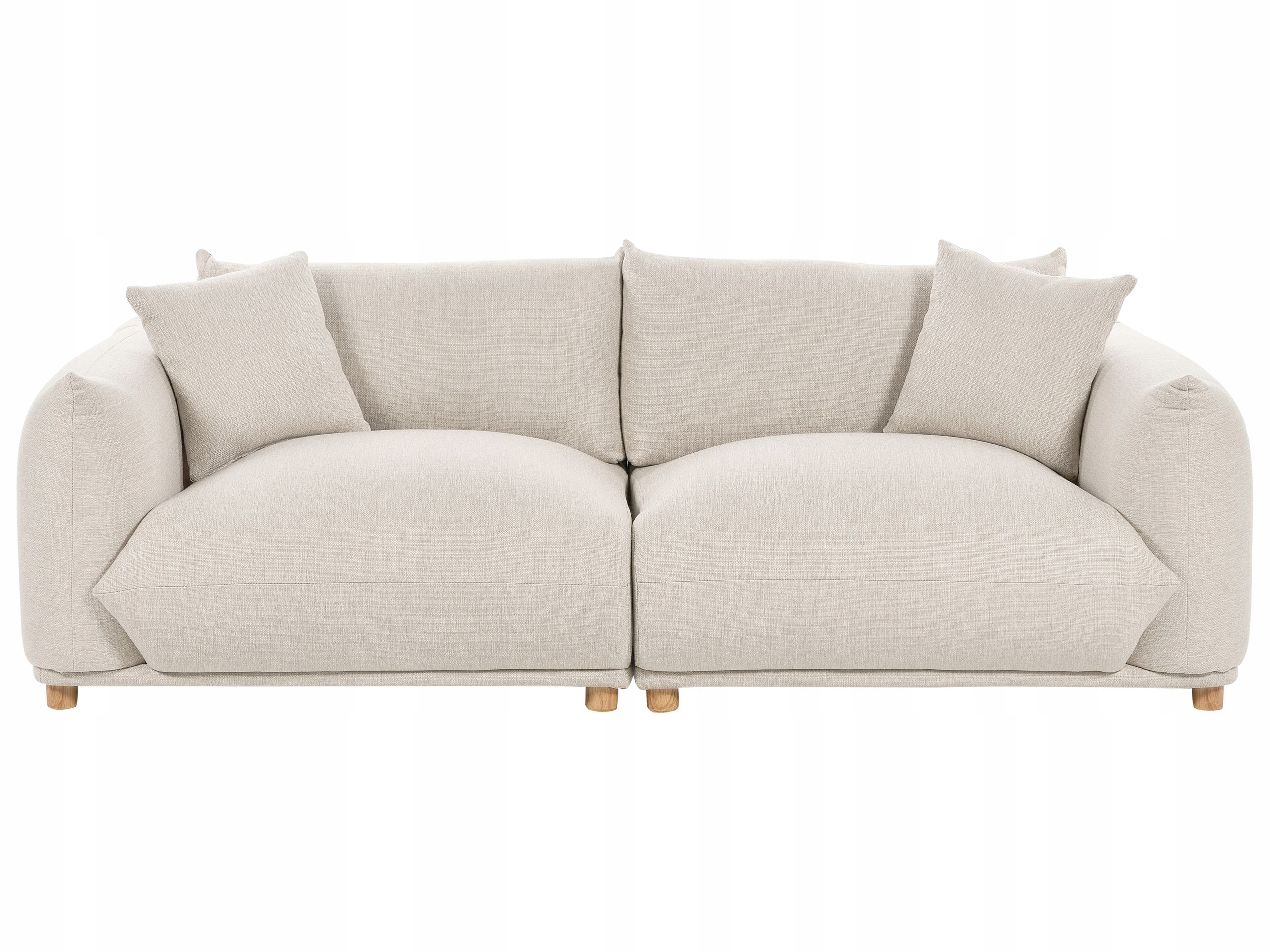 Sofa tapicerowana beżową tkaniną w salonie