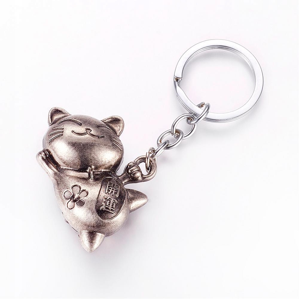 

Brelok Maneki Neko Kot 33x46mm ciemny srebrny