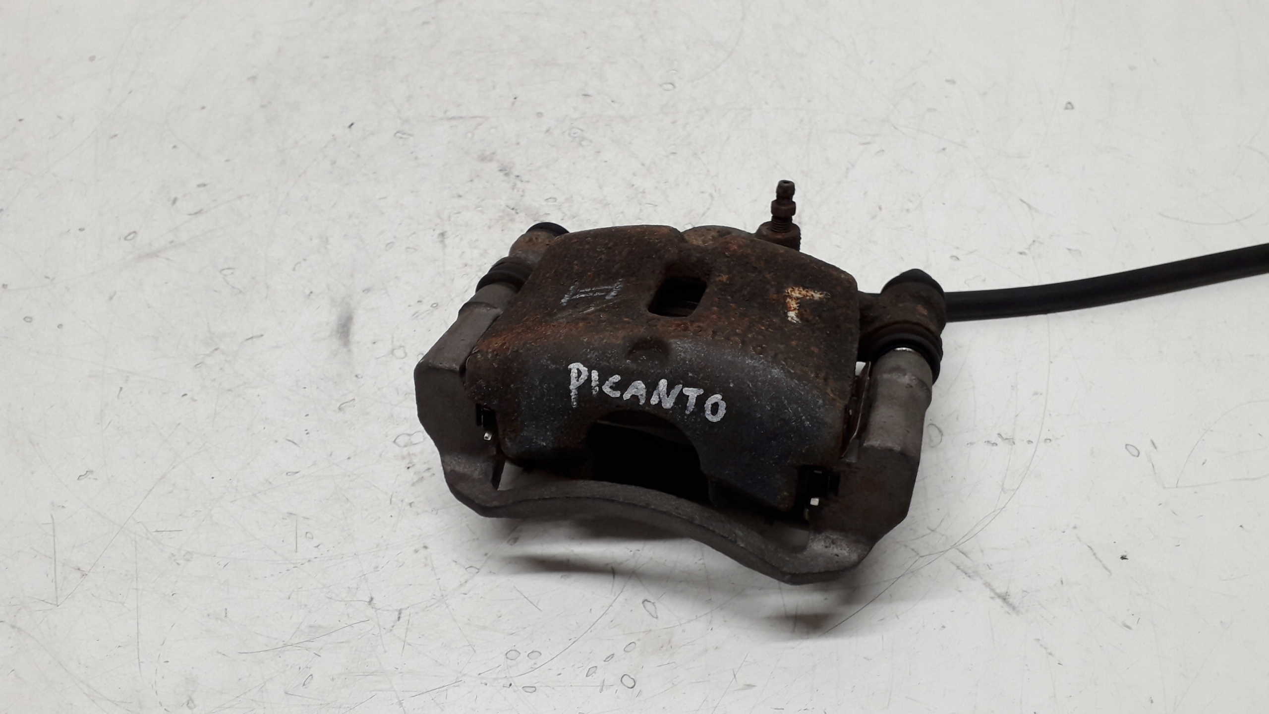 KIA PICANTO 04-07 ZACISK HAMULCOWY LEWY PRZÓD