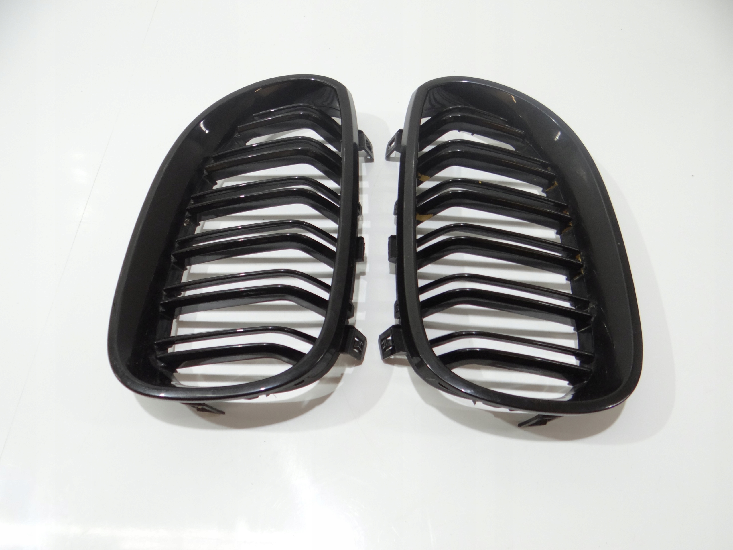 hűtőrács hip pack eleje bal BMW E60 E61 (4273389)