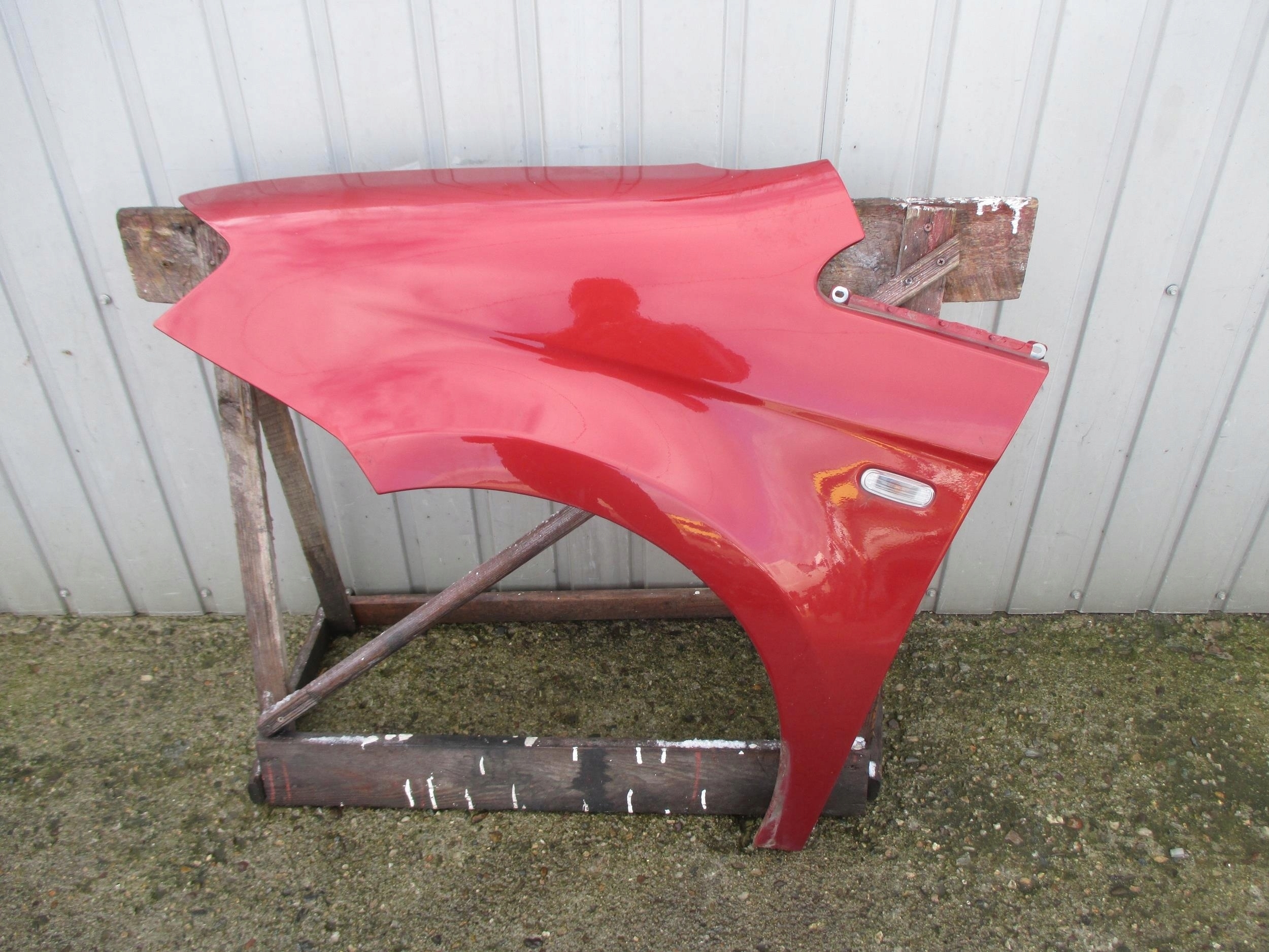 FIAT IDEA 03-10 BŁOTNIIK LEWY PRZÓD LAK 163