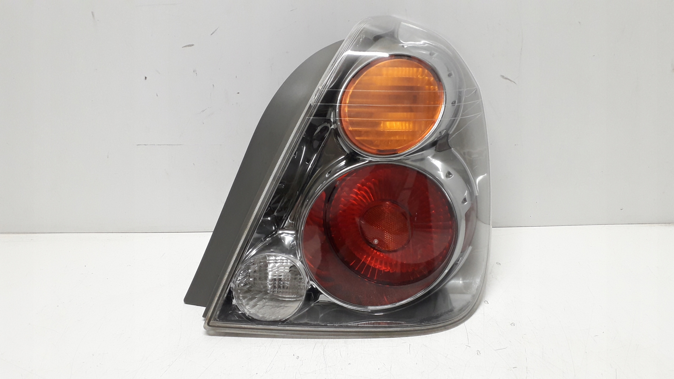 NISSAN ALTIMA L31 02-06 ФАРА ПРАВА ЗАД.