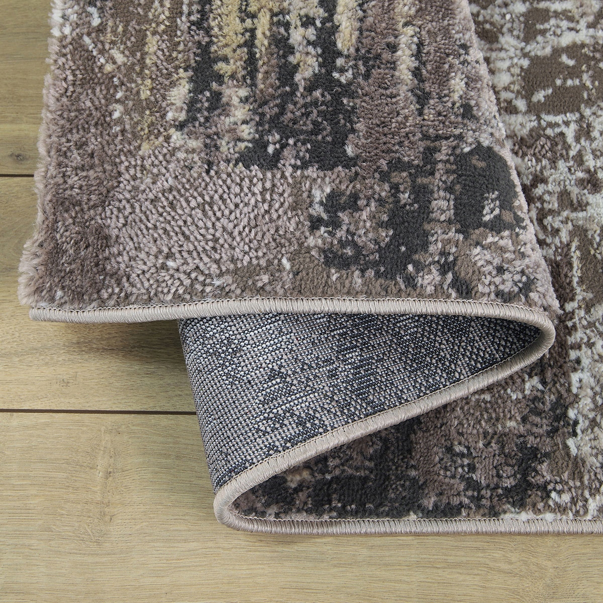 MIĘKKI DYWAN LAILA 2498c DO PRZEDPOKOJU BRĄZOWY SZARY GRUBY LOFT 120x170cm Materiał wykonania polipropylen