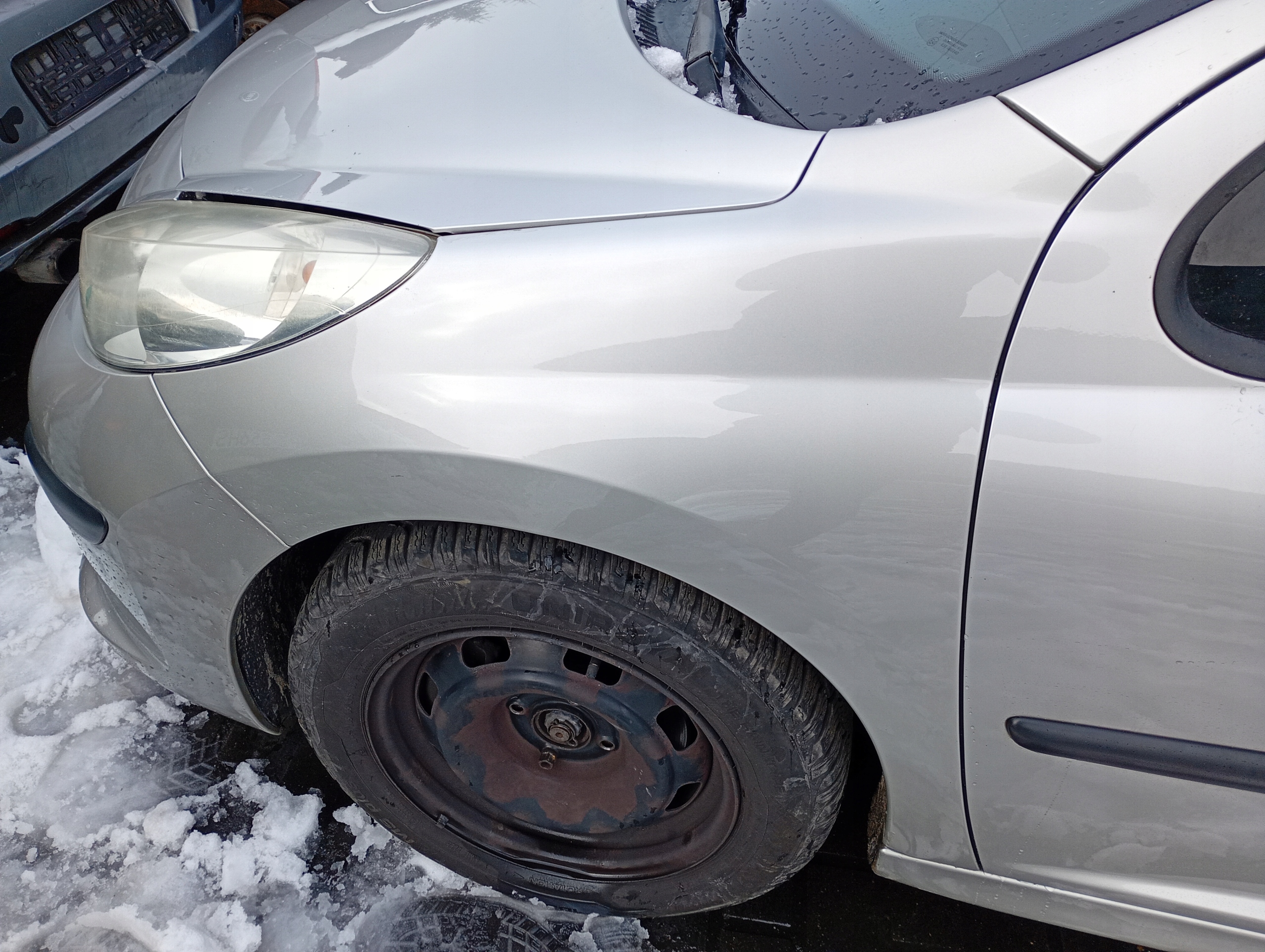 Peugeot 207 SW 07-13 fender left front front srebrny