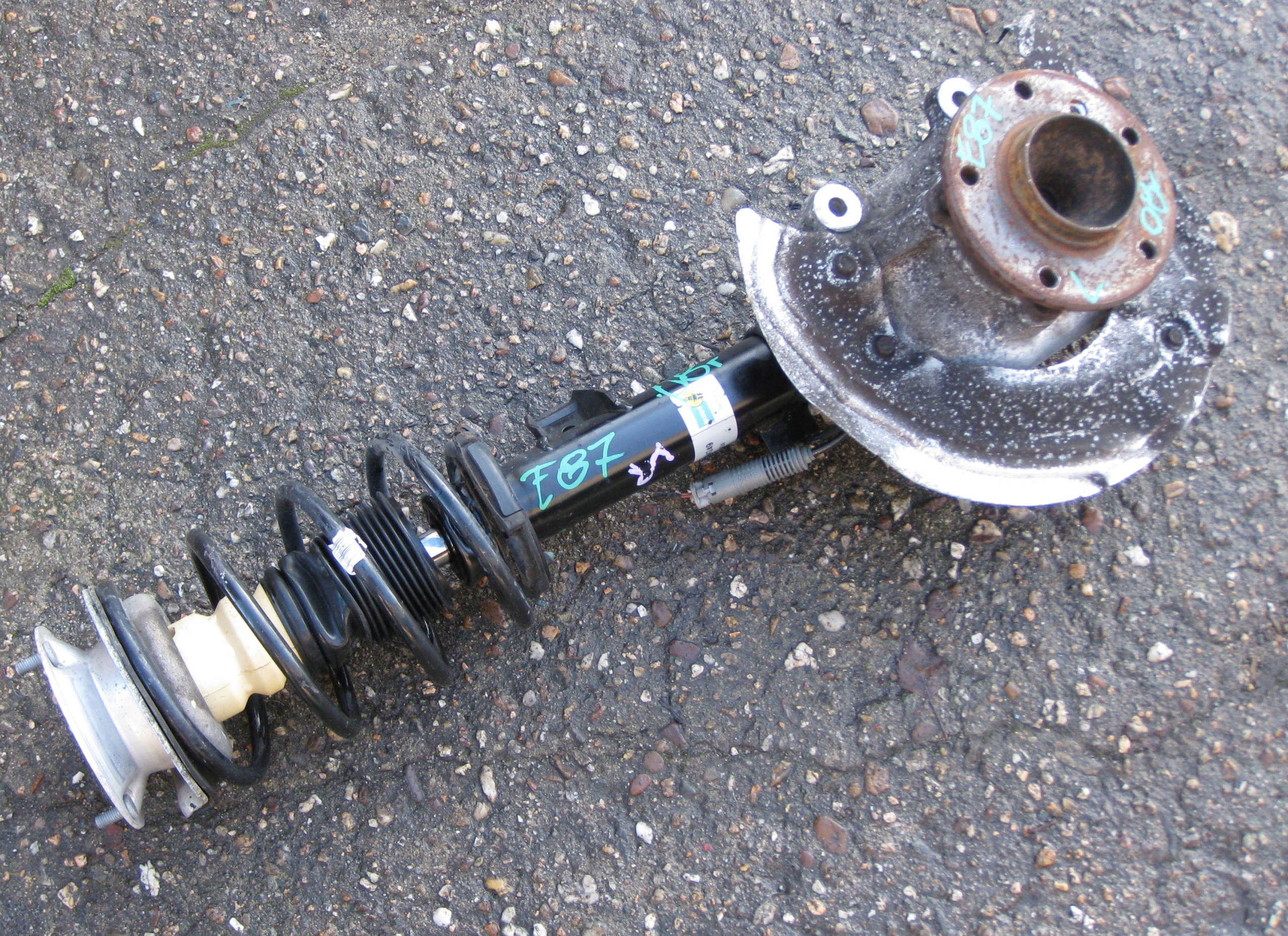 BMW 1 E87 08R. MCPERSON swing shock absorber left front