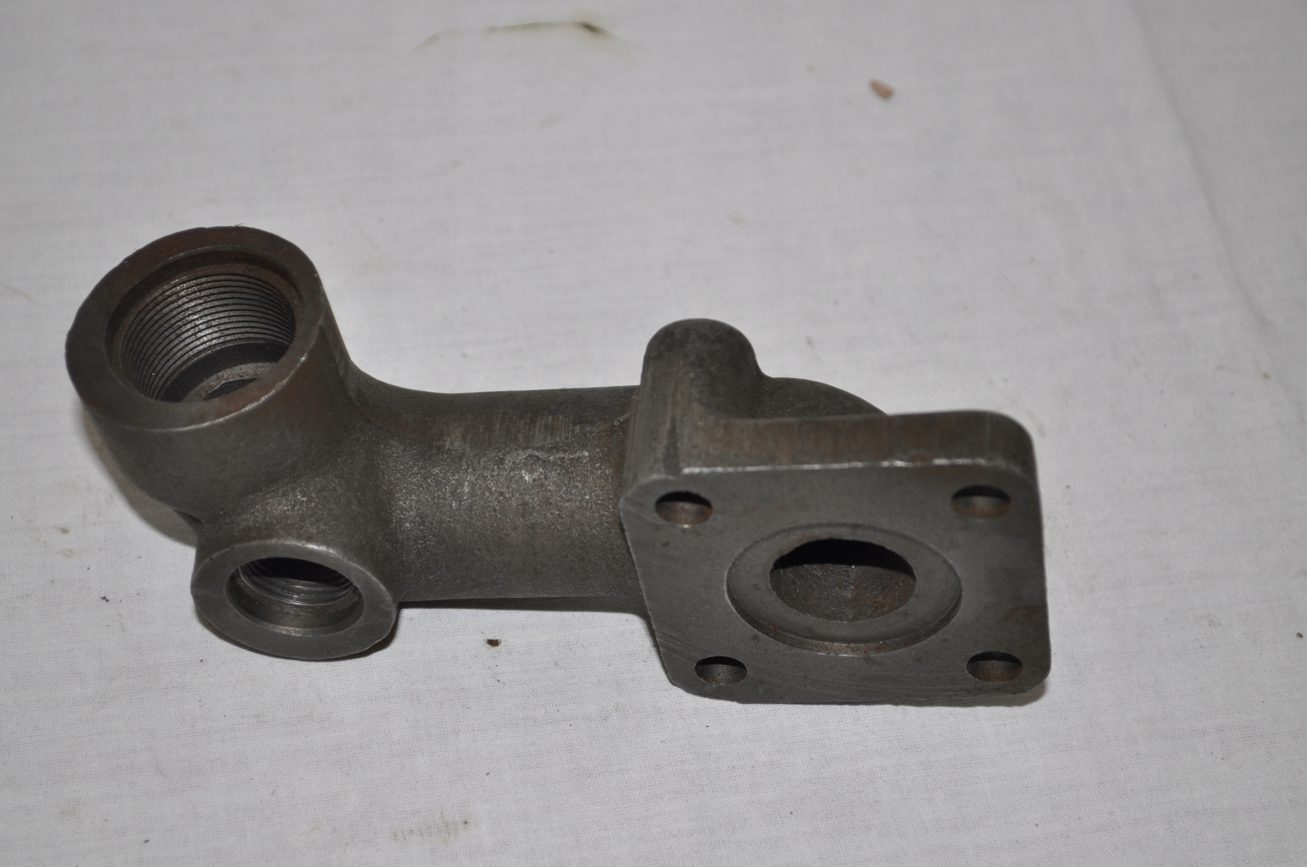 kolanko pompy hydraulicznej JUMZ 454607023