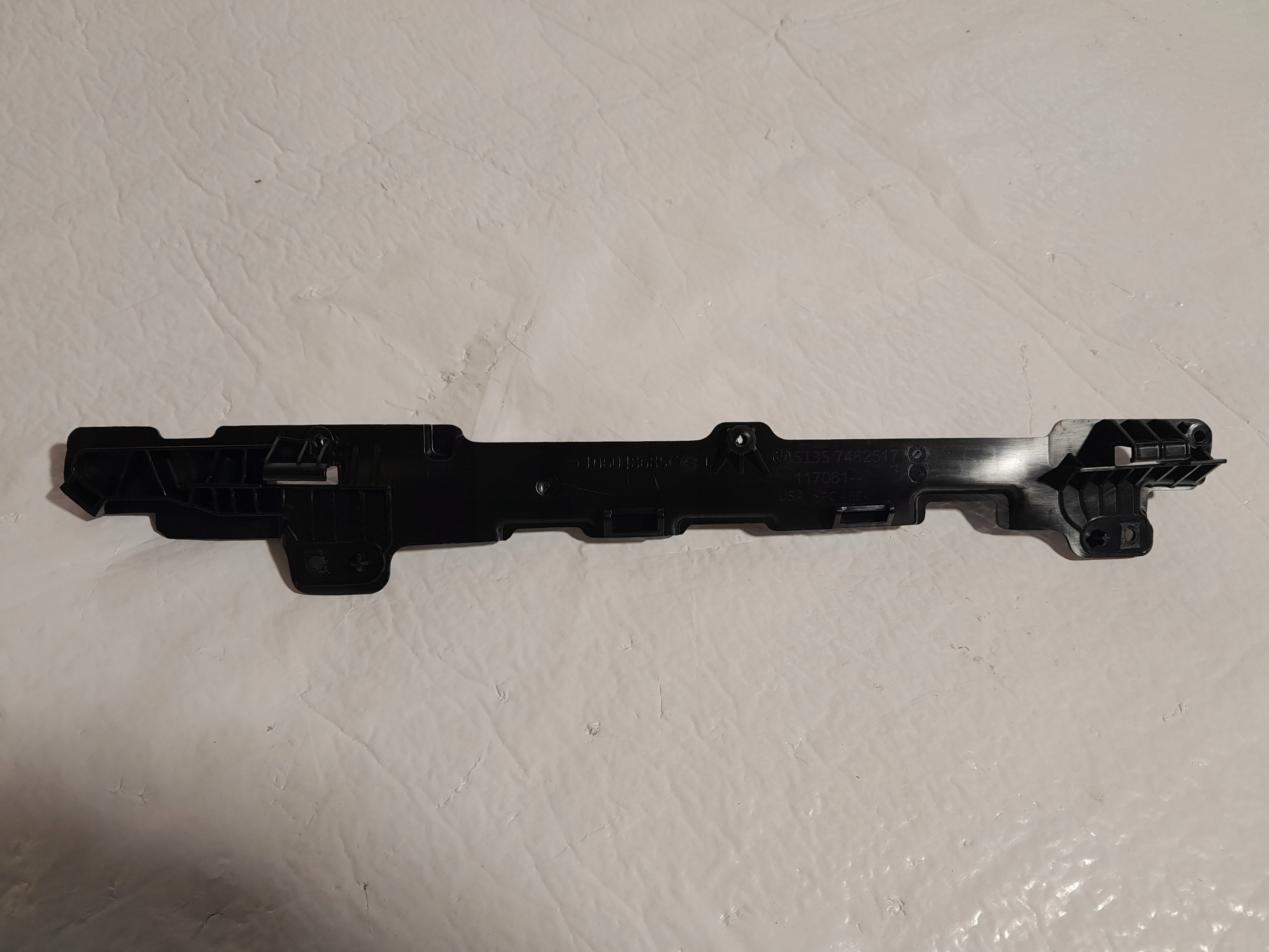 BMW X7 G07 bracket DYSTANSOWY left 7482517