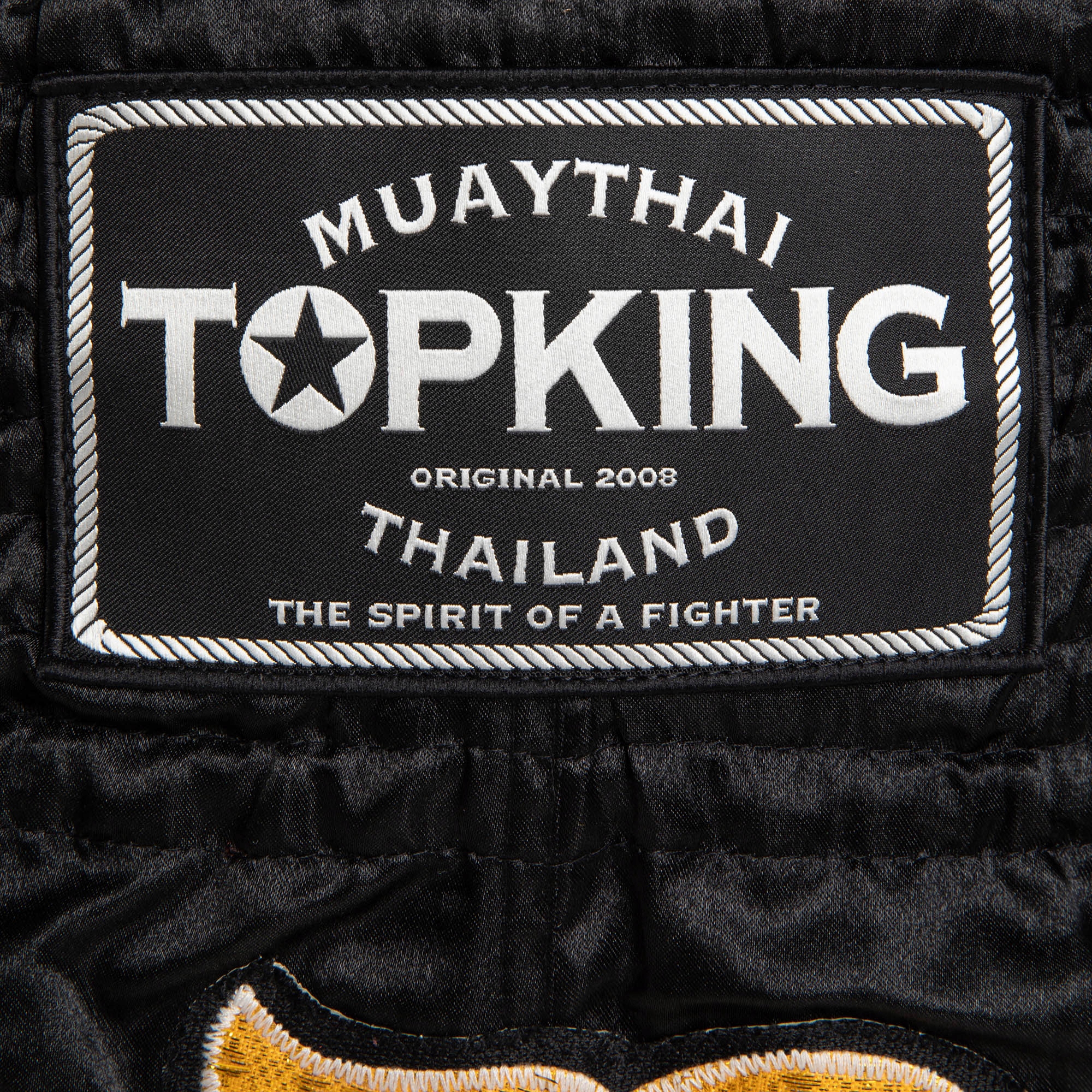 Spodenki treningowe Top King Thai Boxing black/gold M Model TKTBS