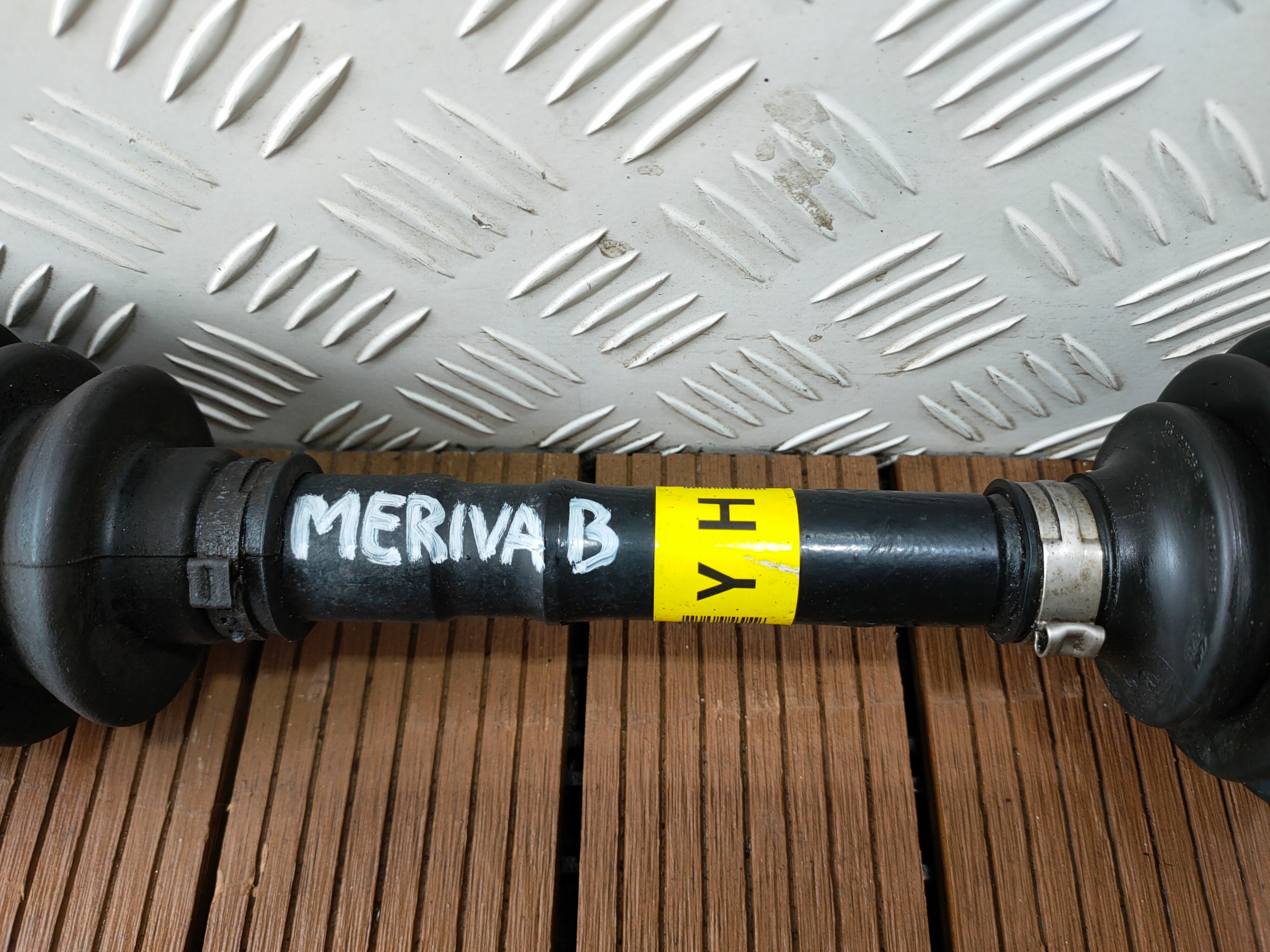OPEL MERIVA B 10-17 1.4T semi-axis front left short. OE SYMBOL YH