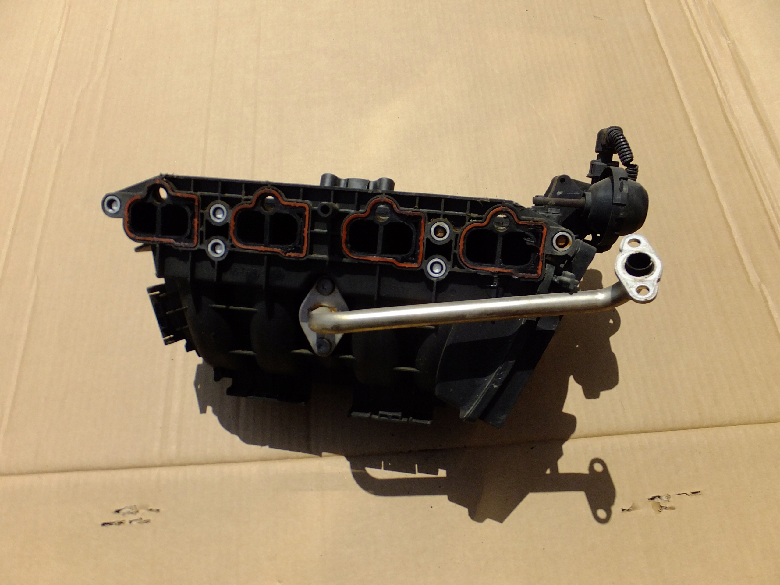intake manifold opel corsa d 1,4 16v 2007r 55557904