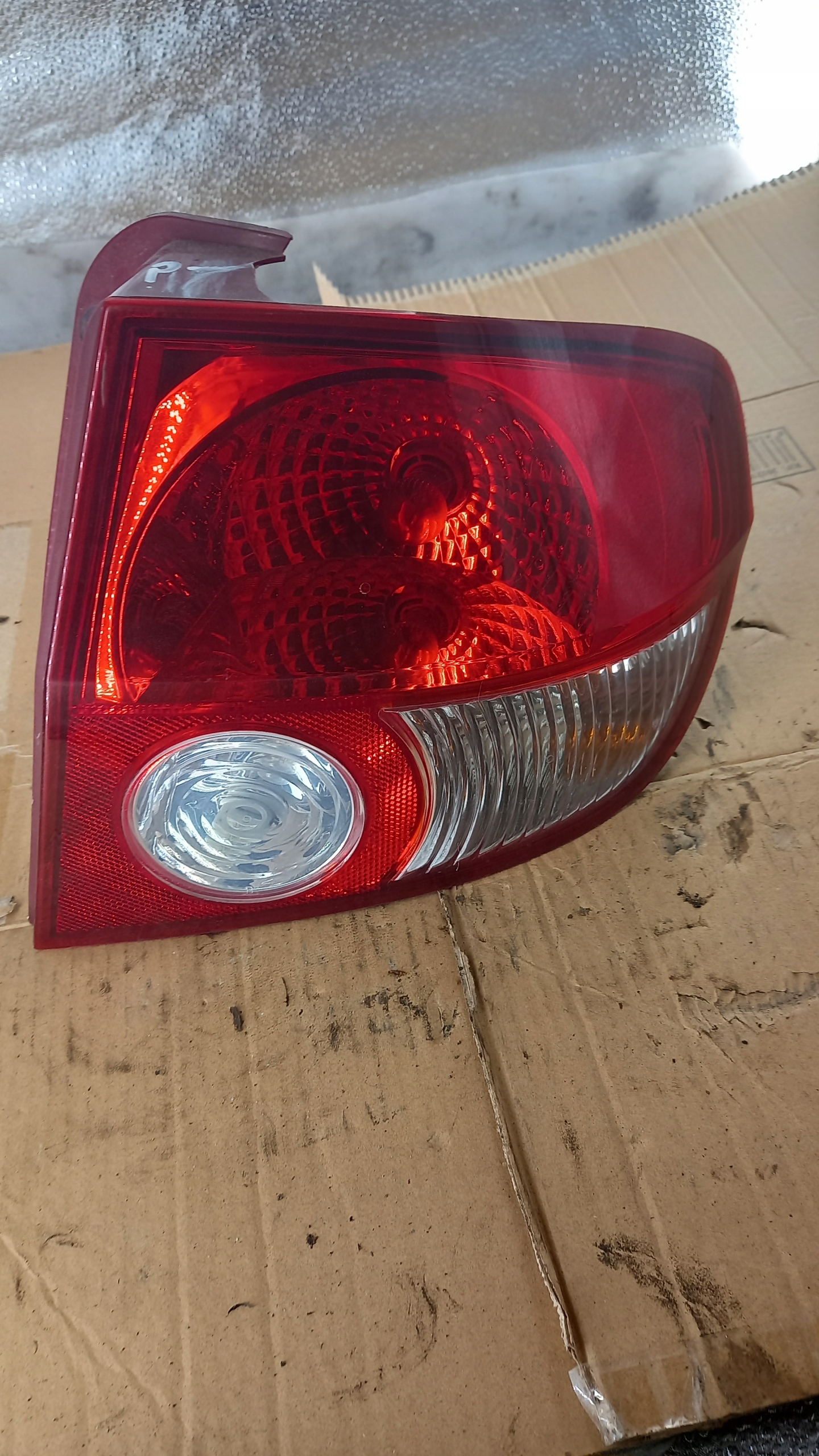 фонарь правый Hyundai GETZ 1.4b 03R HB