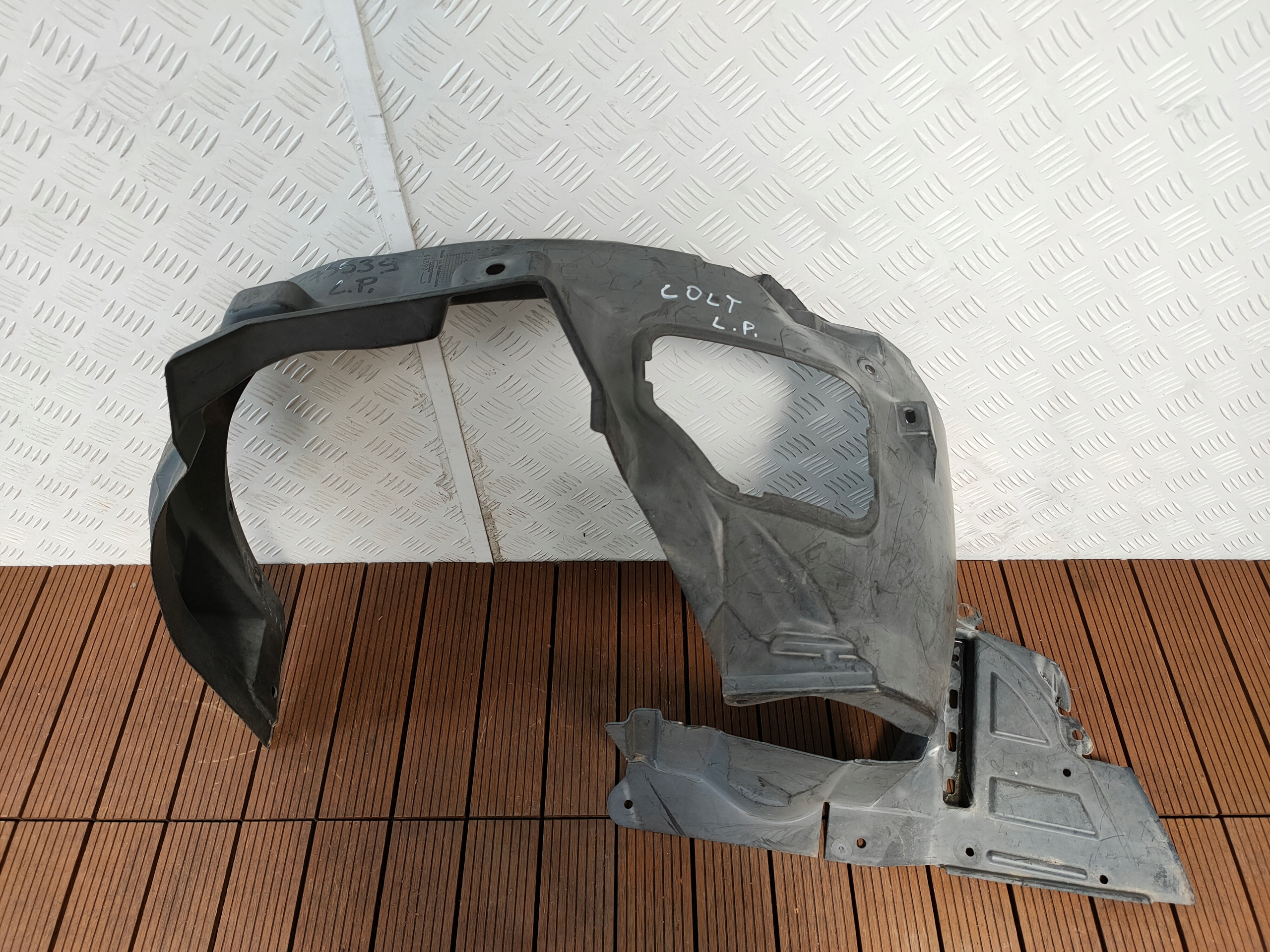 MITSUBISHI COLT Z30 04-12 mudguard front left front MR575539 OE