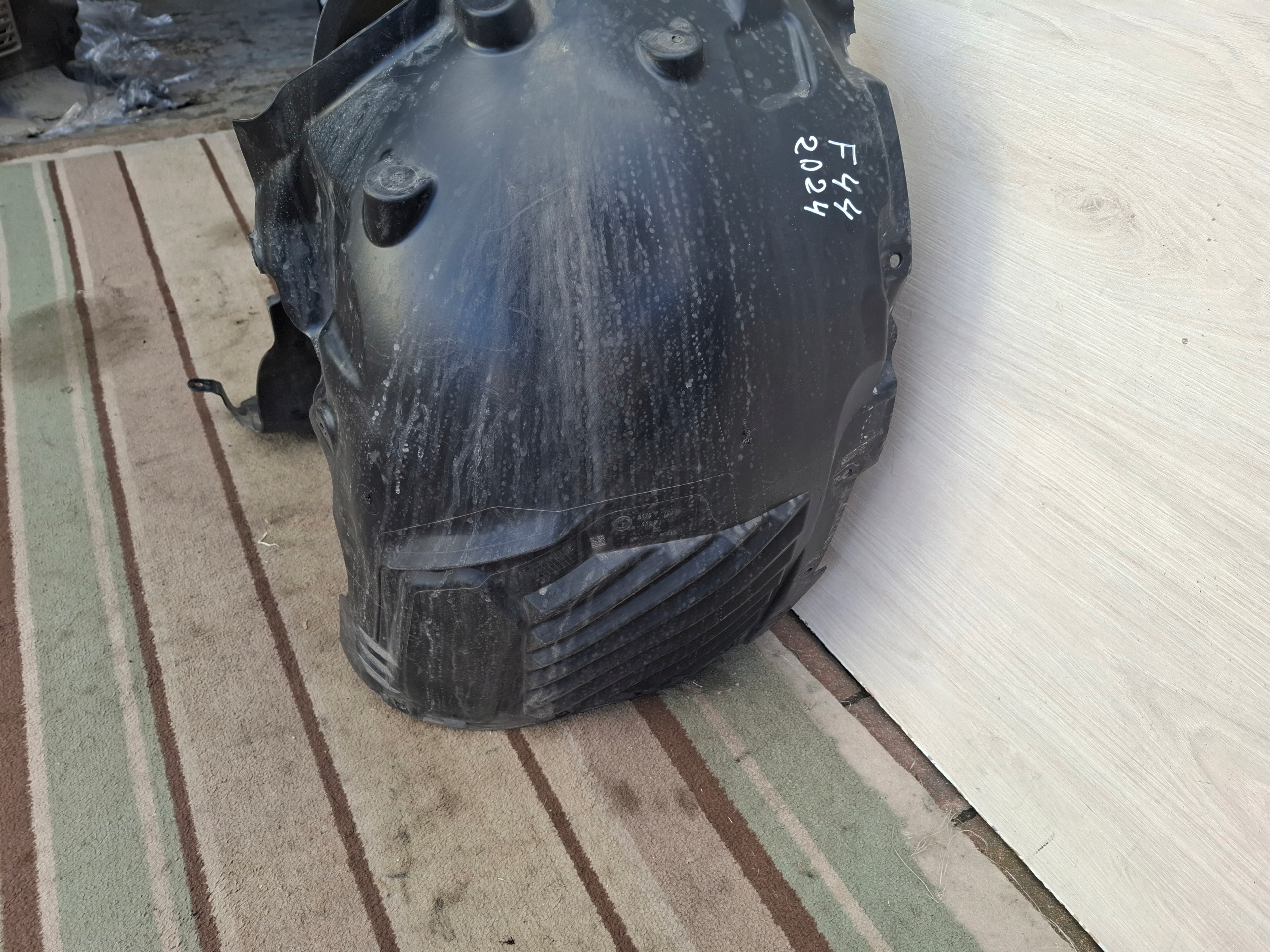 BMW 1 F40 F44 mudguard left front 7436623
