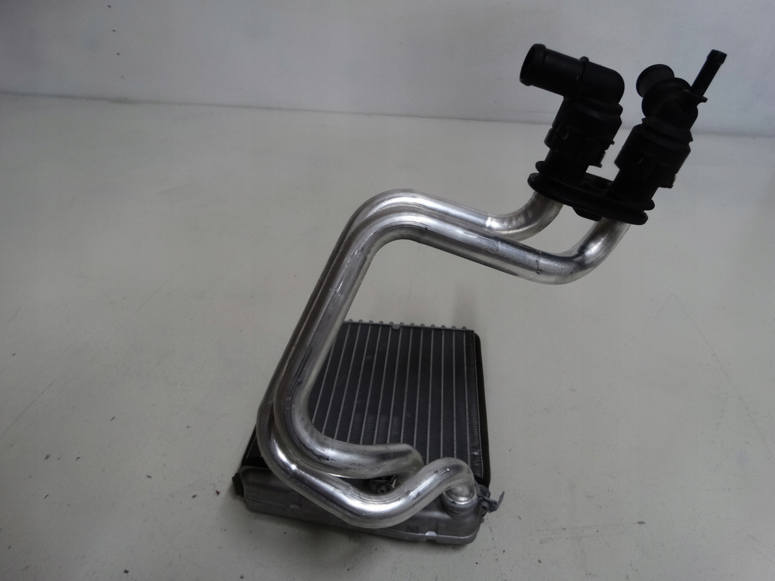 chladič topení vody VW GOLF V 1K0819031