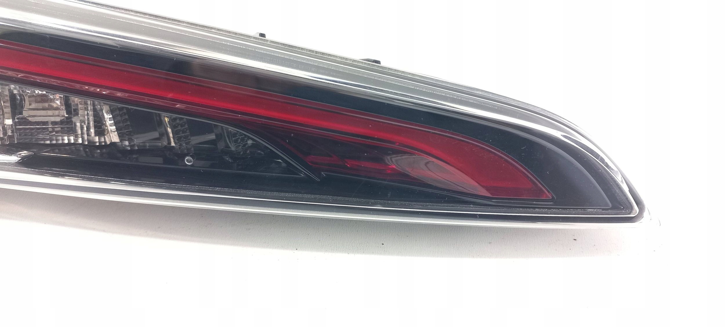 Toyota Corolla E210 E21 light of the rear bonnet boot left 02429 (R318)