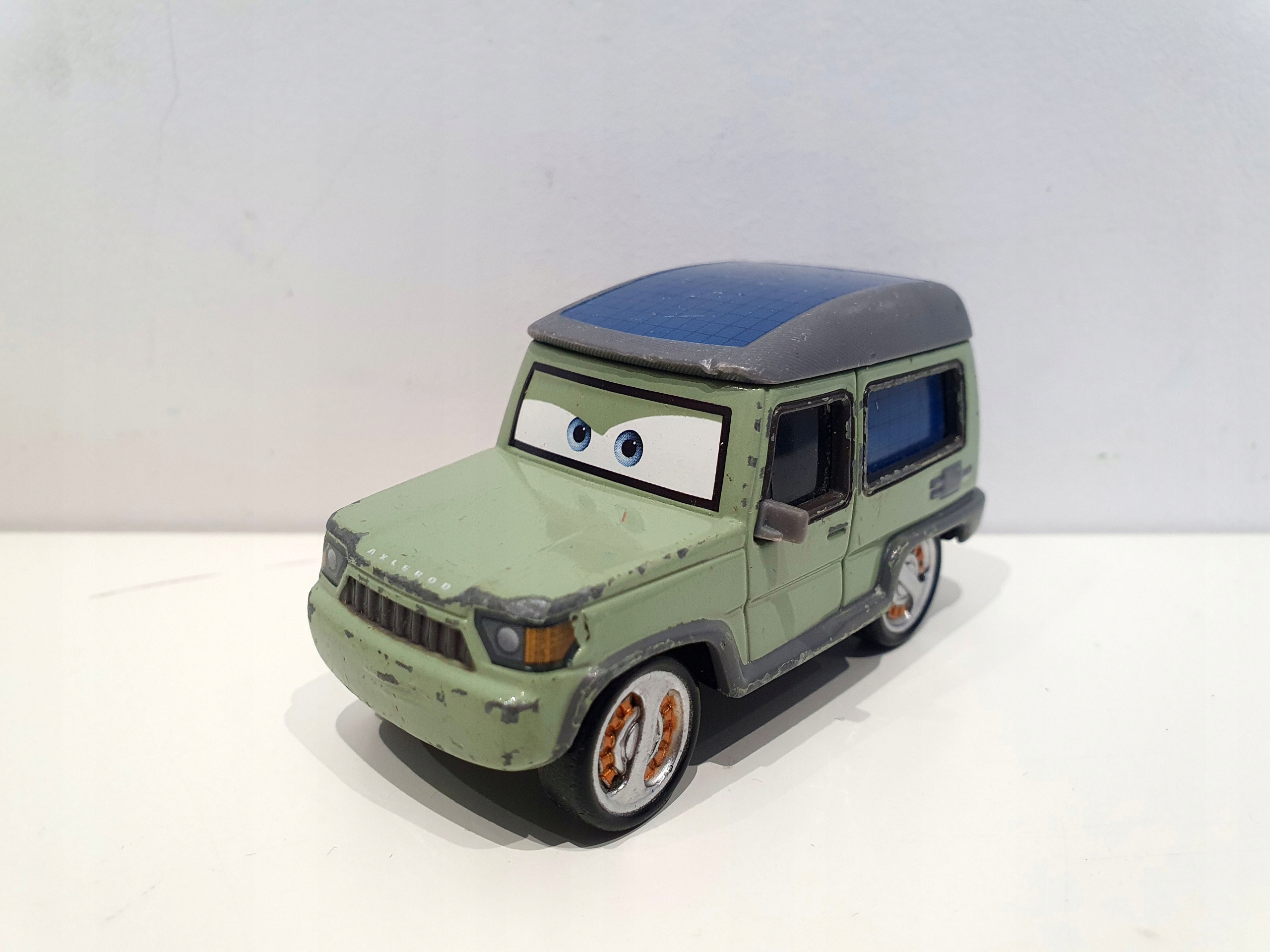 Mattel Disney Pixar Auta Cars Miles Axlerod Baron Rydz DXV45 EAN (GTIN) 0194735036301