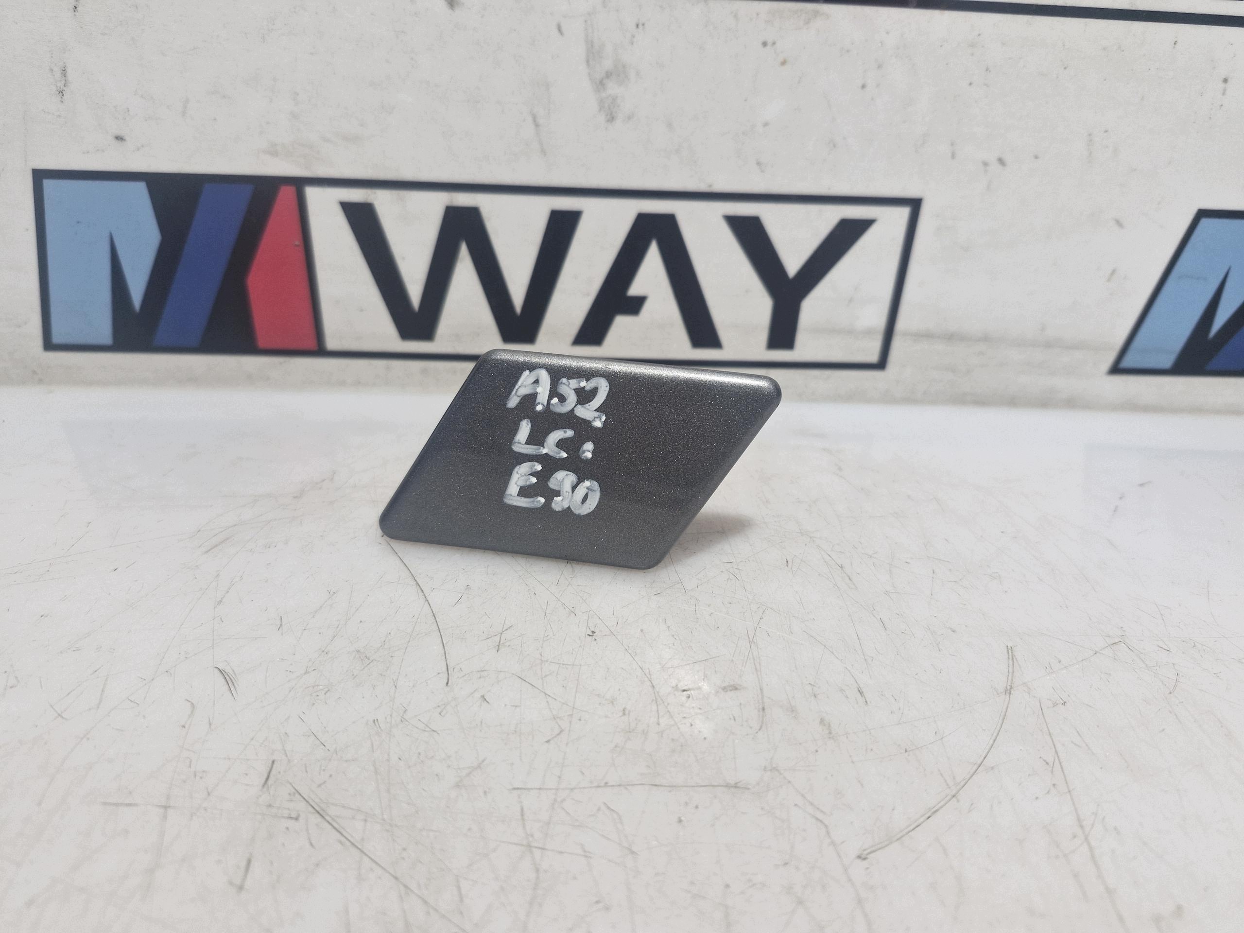7203495 BMW E90 LCI Copri LAVAFARO sinistra A52