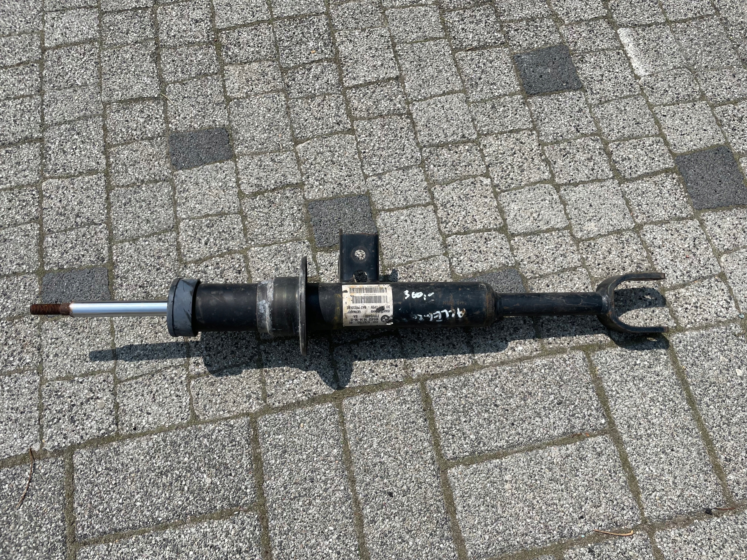 shock absorber front left BMW F11 6797765 original