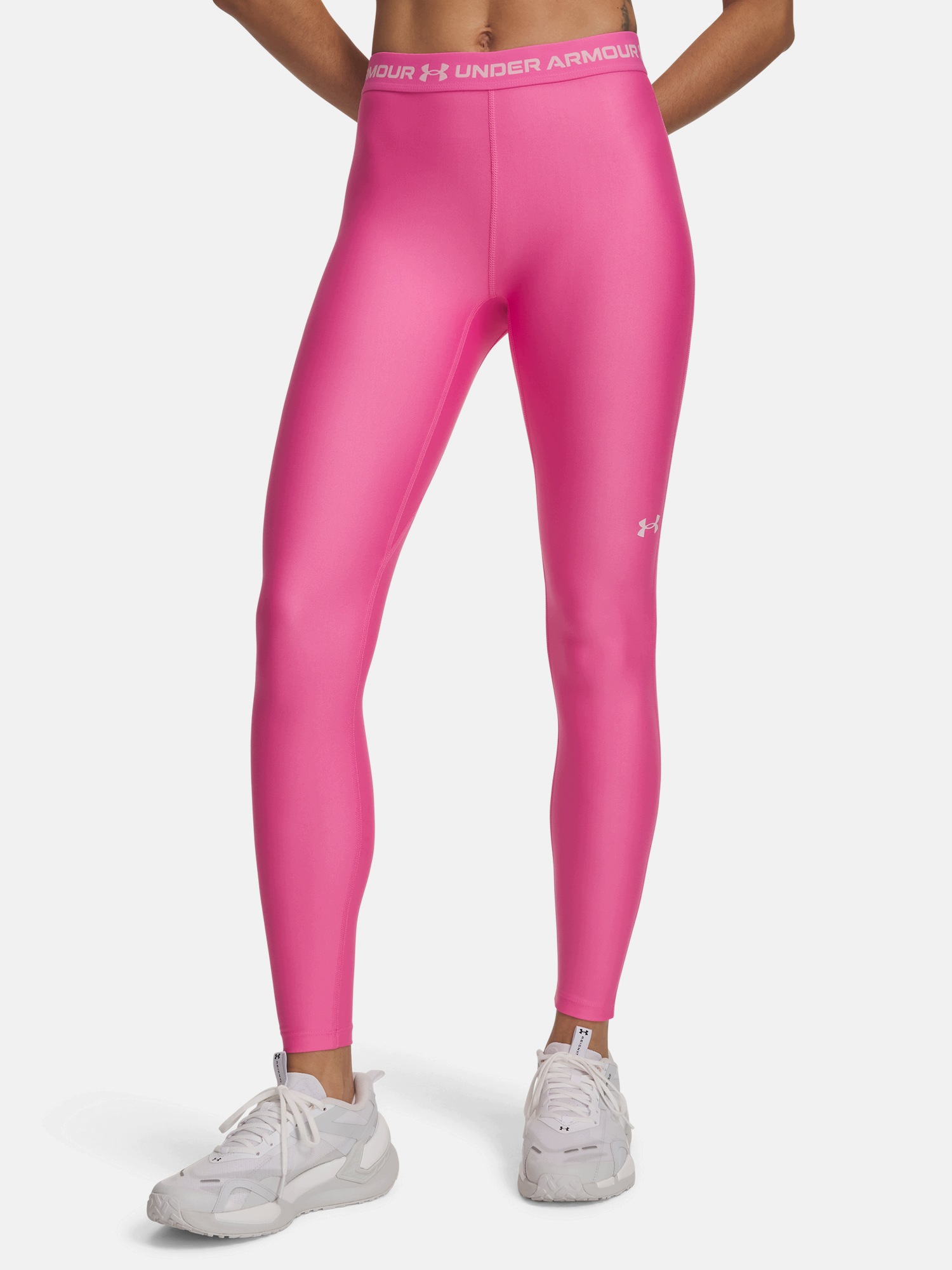 Spodnie treningowe długa Under Armour L różowy