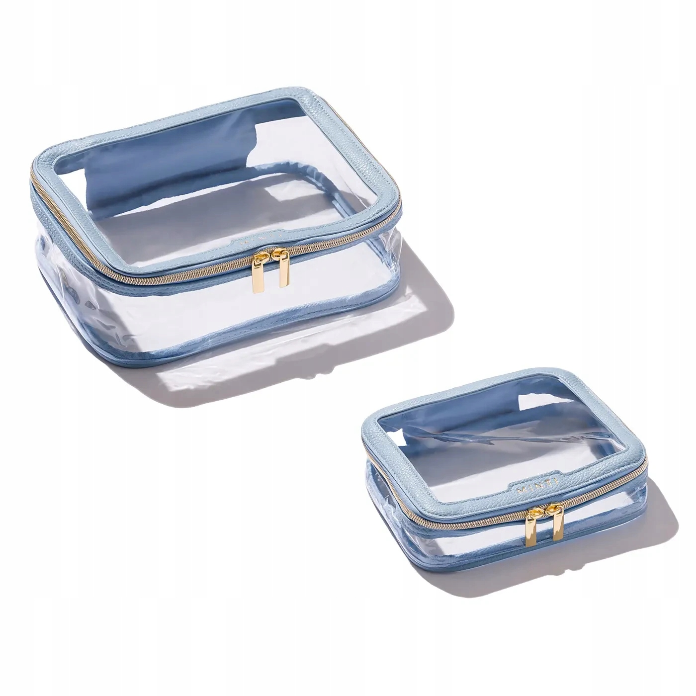 Minti Collection Cestovní taška světle modrá Sada 2 cestovních kosmetických tašek