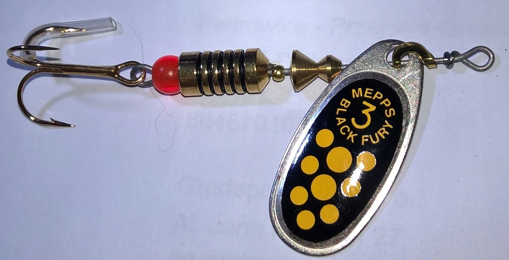 Błystka Mepps Black Fury 3/6,5g srebr.czar żółte k