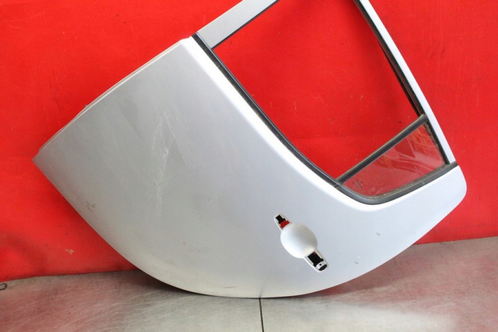door left rear part rear. silver MITSUBISHI L200 06-15