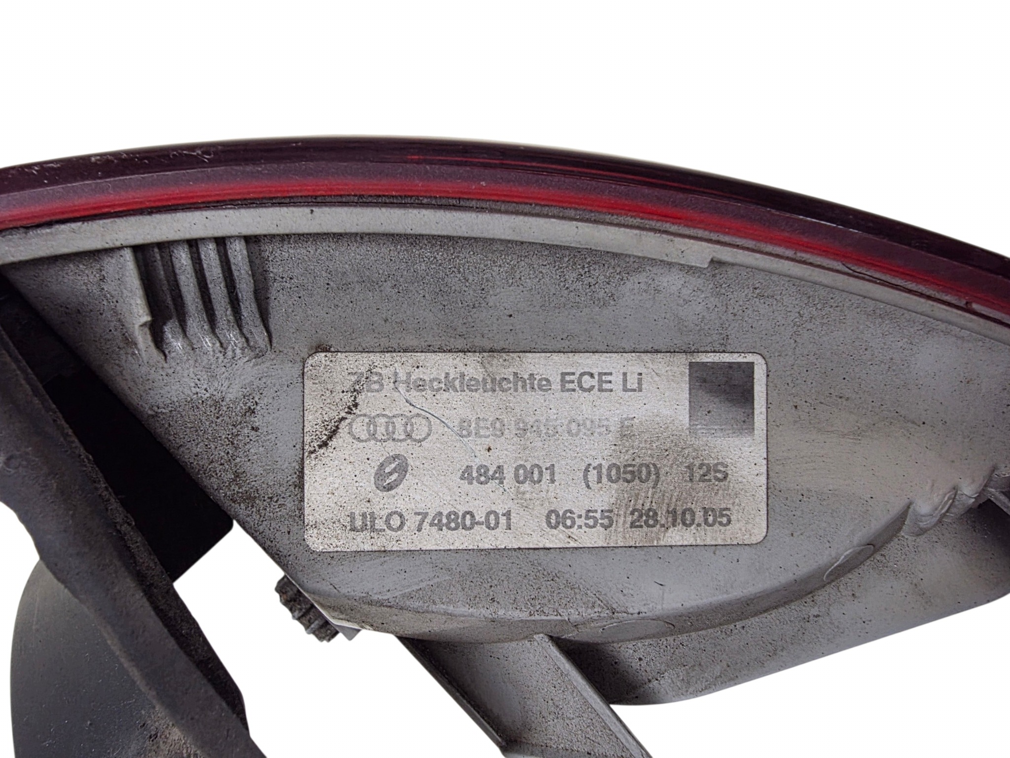 AUDI A4 B7 KOMBI light rear left dark (DYMIONA) original. 8E9945095E