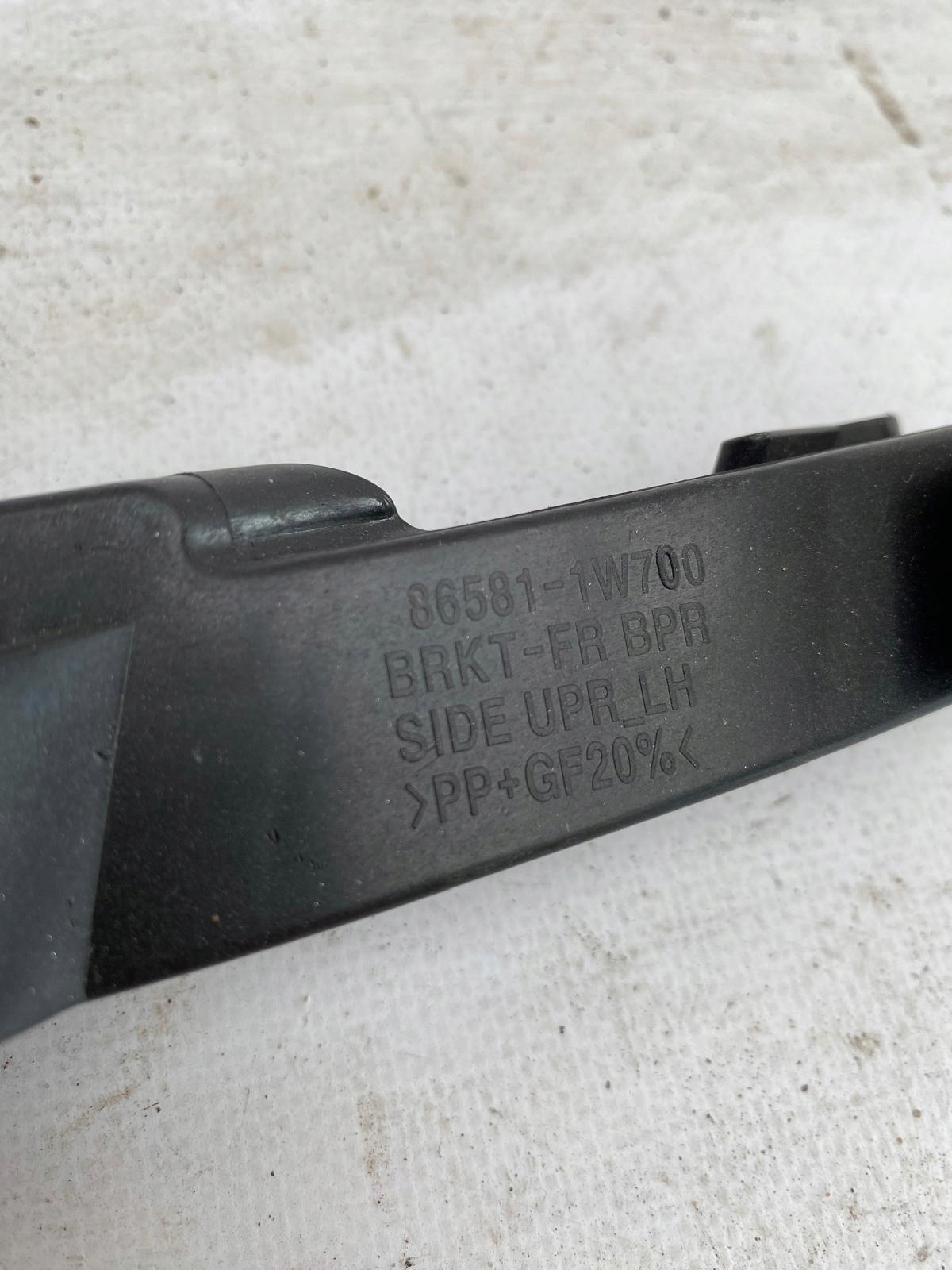 KIA RIO 3 III 15- bumper bracket left front