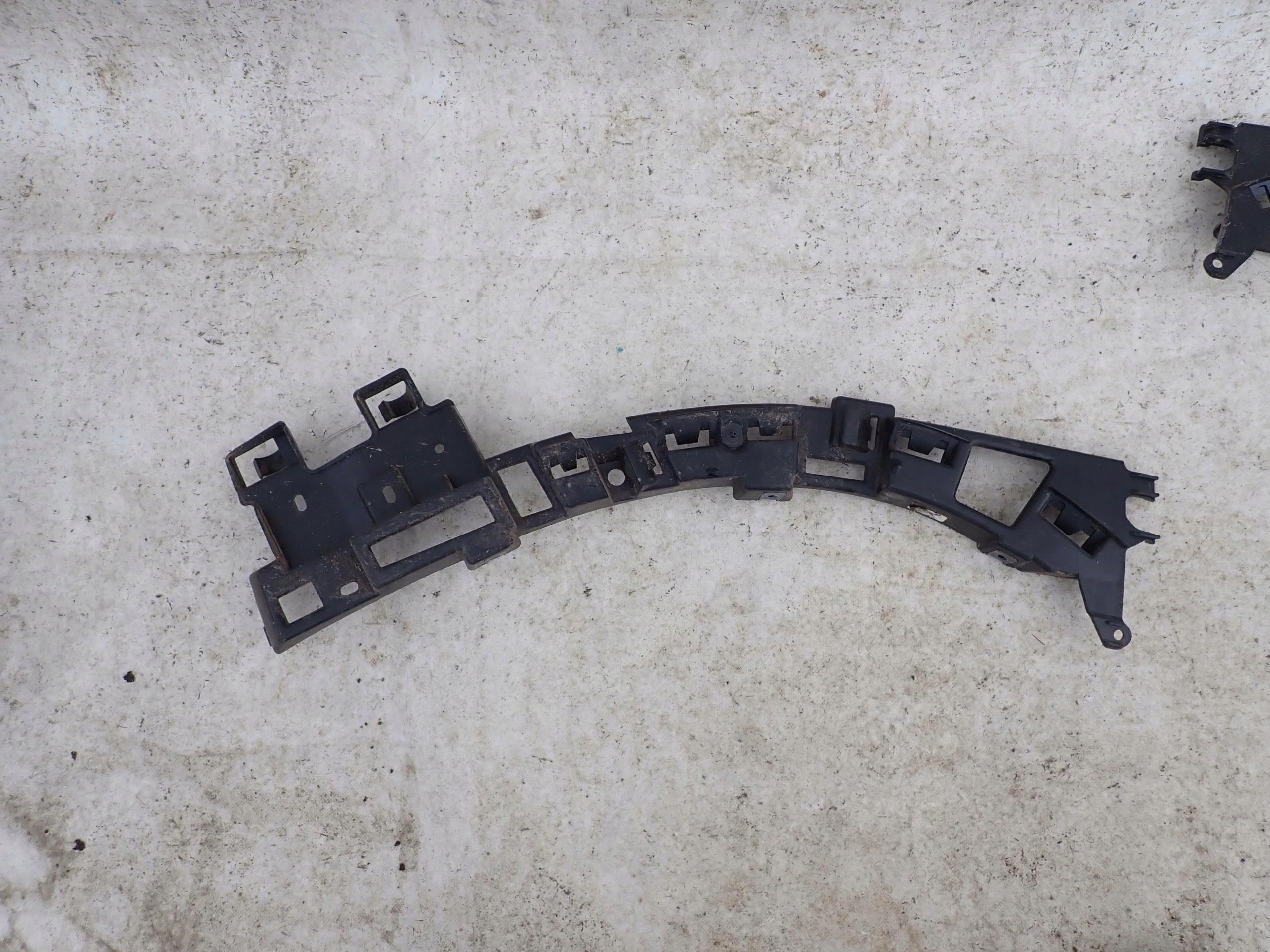 BERLINGO RIFTER COMBO 18- support holder of a bumper left rear part