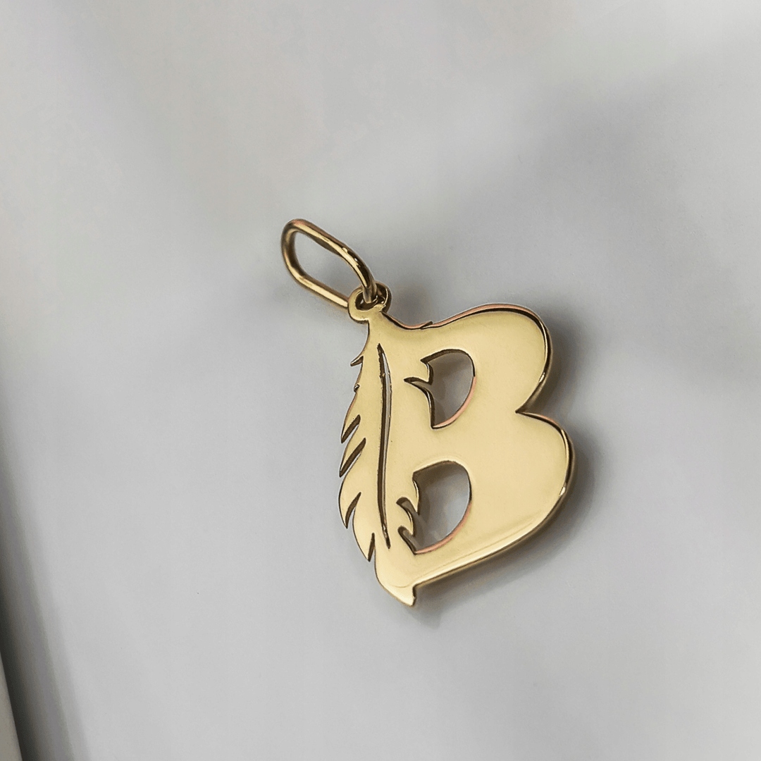 Zlatý přívěsek písmenko B s peřím pr.585